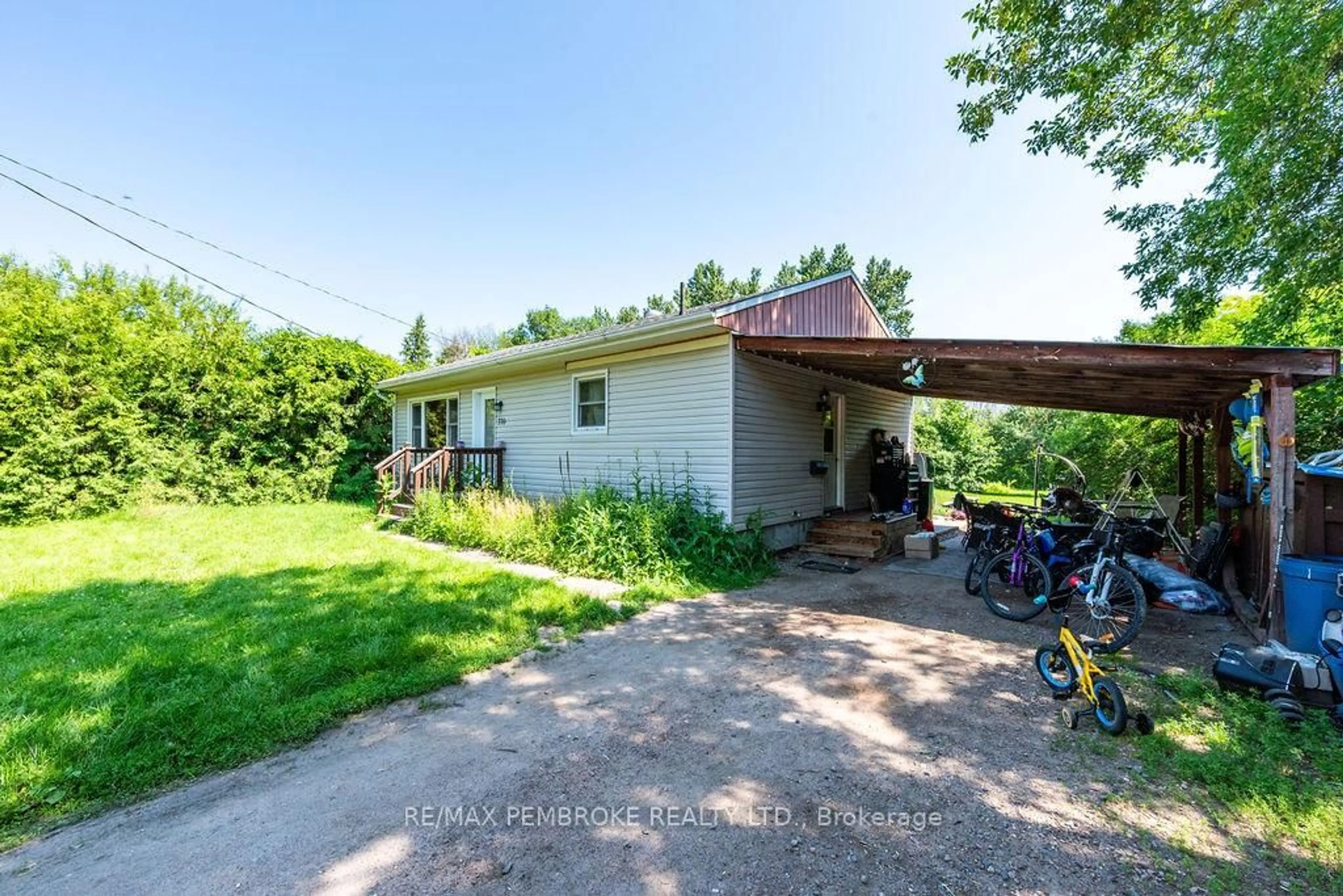 A pic from outside/outdoor area/front of a property/back of a property/a pic from drone, unknown for 770 Mcguire St, Petawawa Ontario K8A 7C5