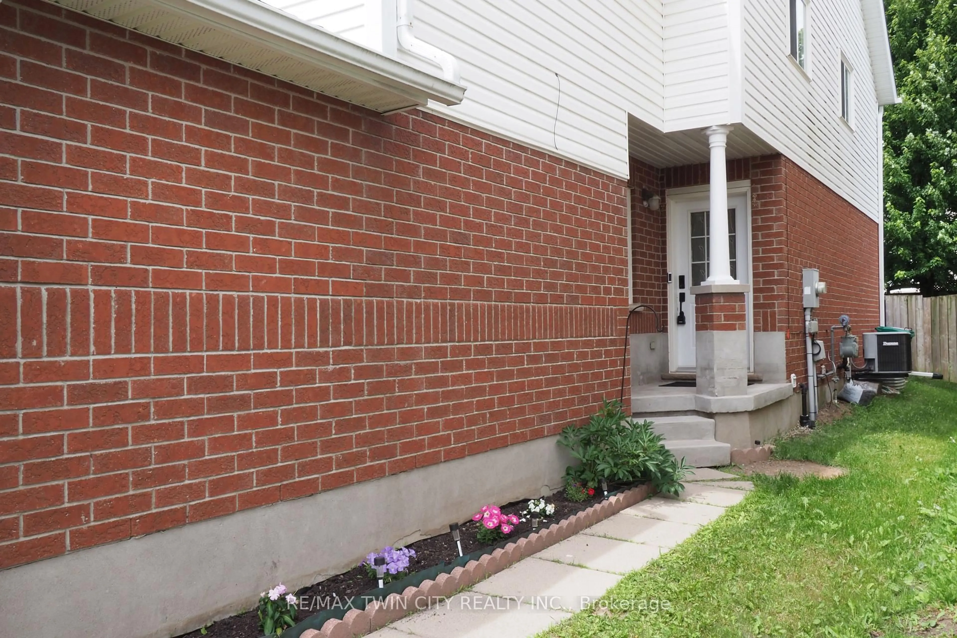 Home with brick exterior material, street for 14 Donnenwerth Dr, Waterloo Ontario N2E 3X2