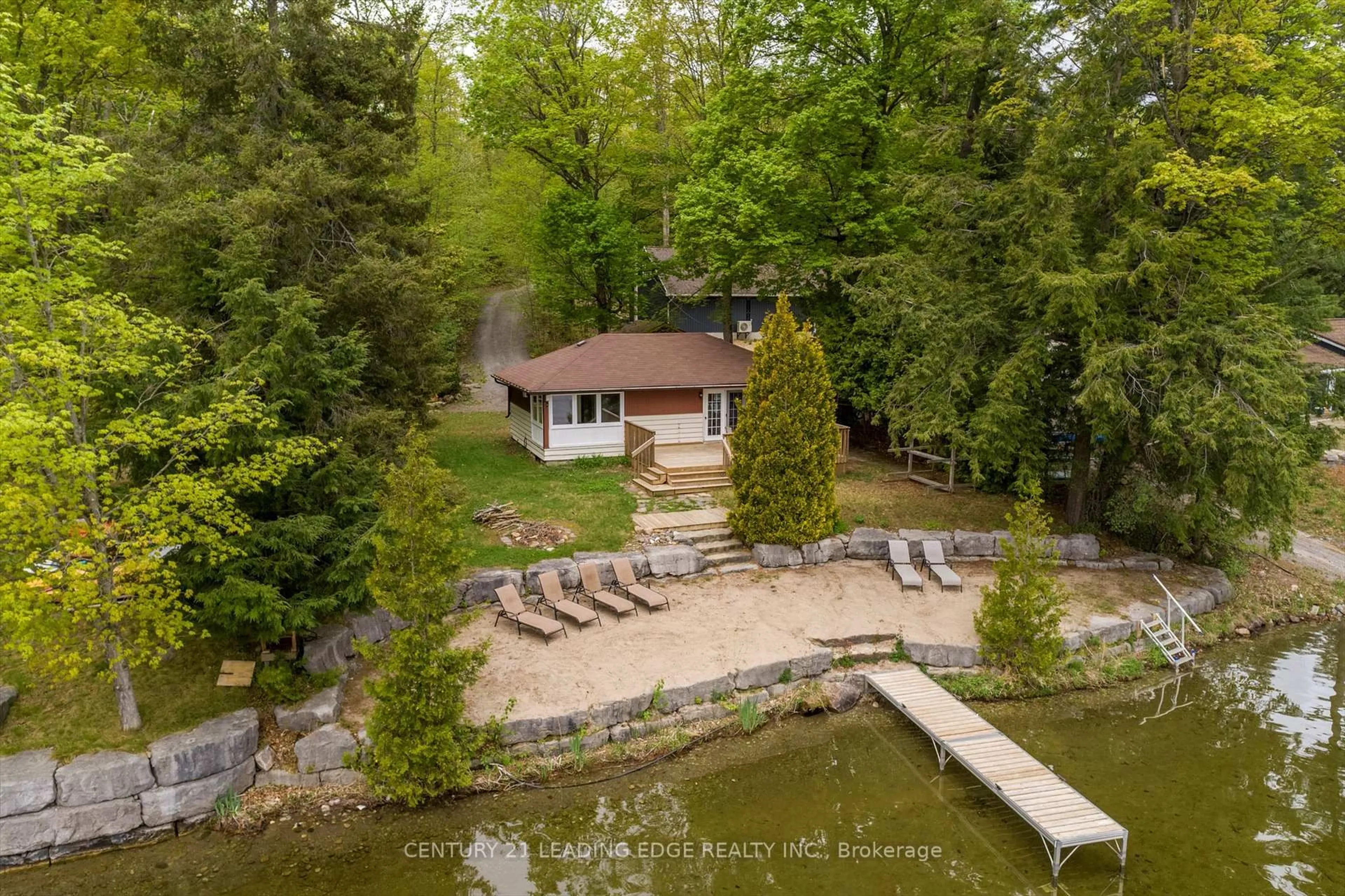 A pic from outside/outdoor area/front of a property/back of a property/a pic from drone, water/lake/river/ocean view for 1963 WHITE LAKE Rd, Douro-Dummer Ontario K0L 2H0