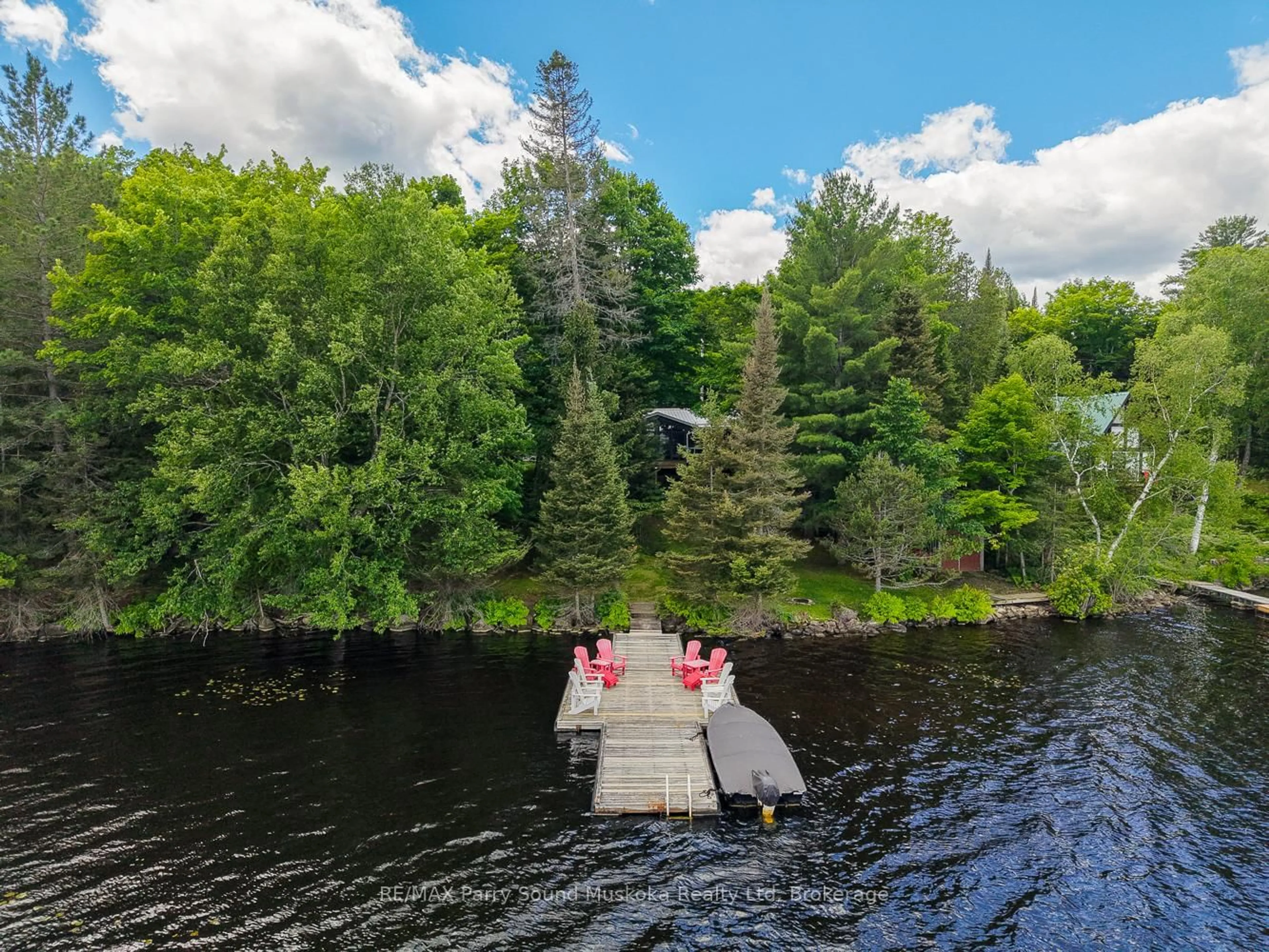 A pic from outside/outdoor area/front of a property/back of a property/a pic from drone, water/lake/river/ocean view for 147 Black Bear Rd, Magnetawan Ontario P0A 1C0