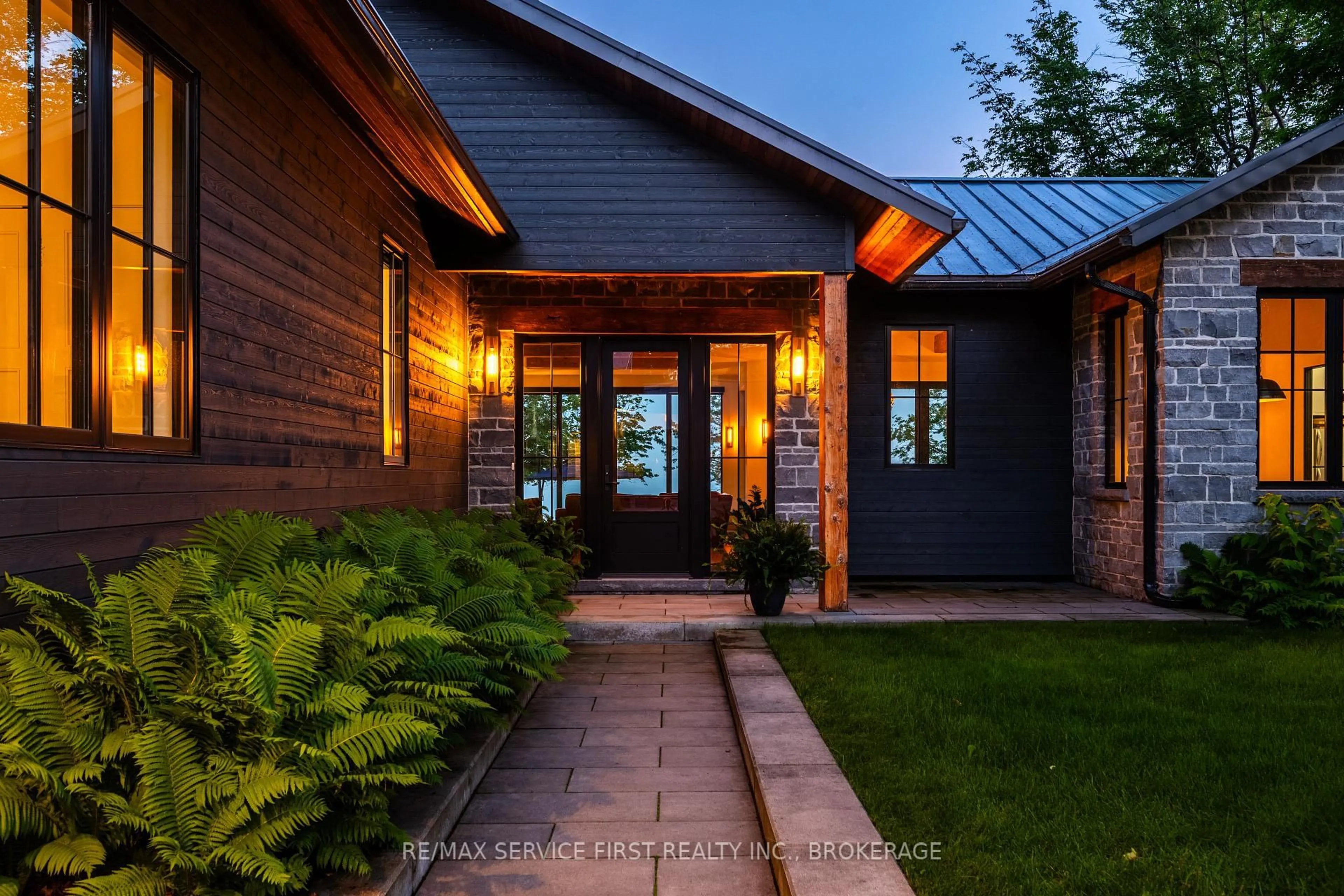 Home with brick exterior material, street for 1027 Old Front Rd, Kingston Ontario K7M 4M2