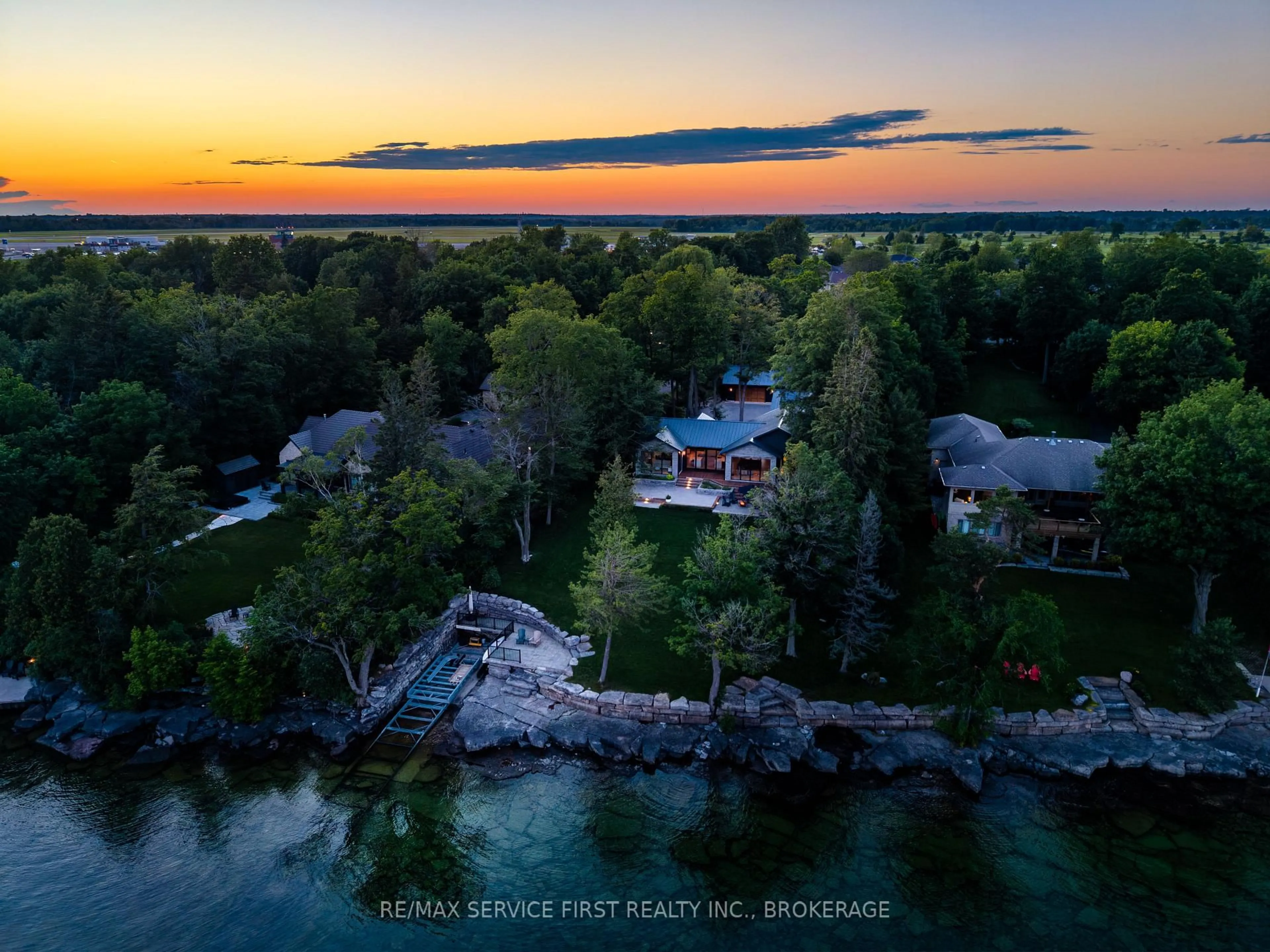 A pic from outside/outdoor area/front of a property/back of a property/a pic from drone, water/lake/river/ocean view for 1027 Old Front Rd, Kingston Ontario K7M 4M2