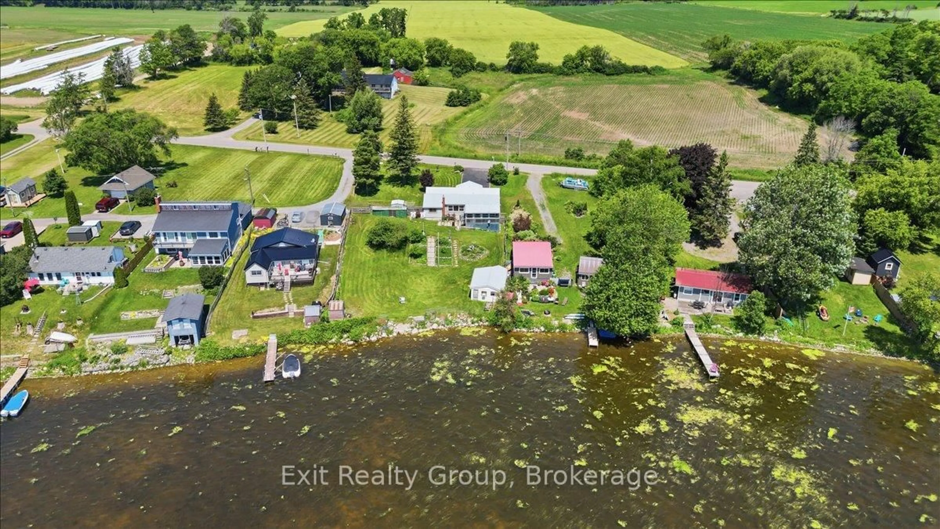 A pic from outside/outdoor area/front of a property/back of a property/a pic from drone, water/lake/river/ocean view for 1083 Lakeside Dr, Prince Edward County Ontario K0K 1T0