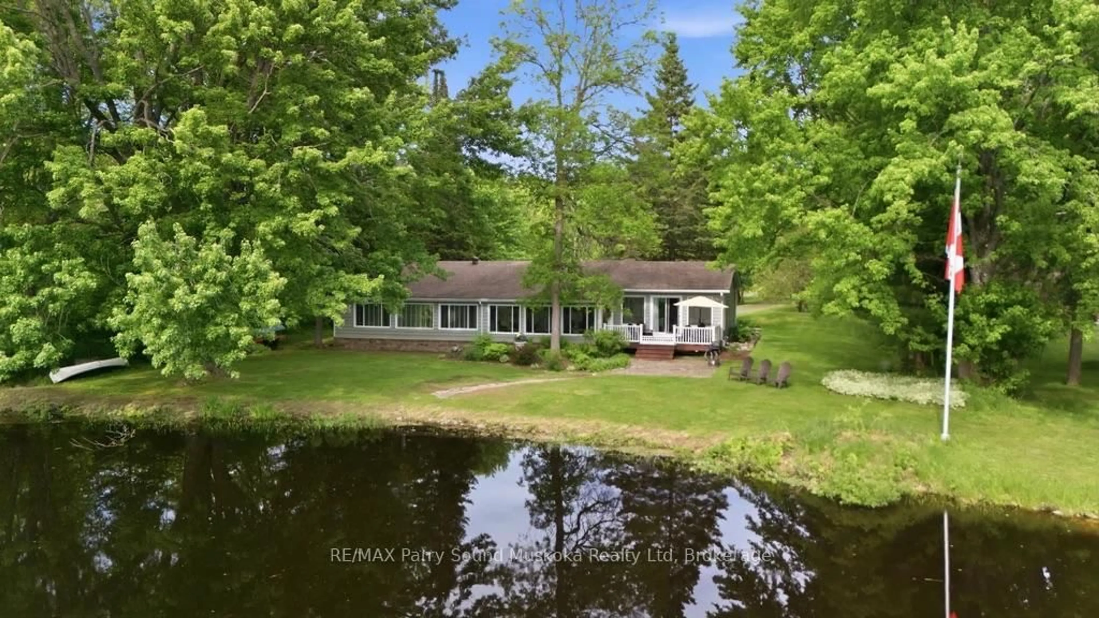 A pic from outside/outdoor area/front of a property/back of a property/a pic from drone, water/lake/river/ocean view for 49 Maple St, Seguin Ontario P0C 1J0