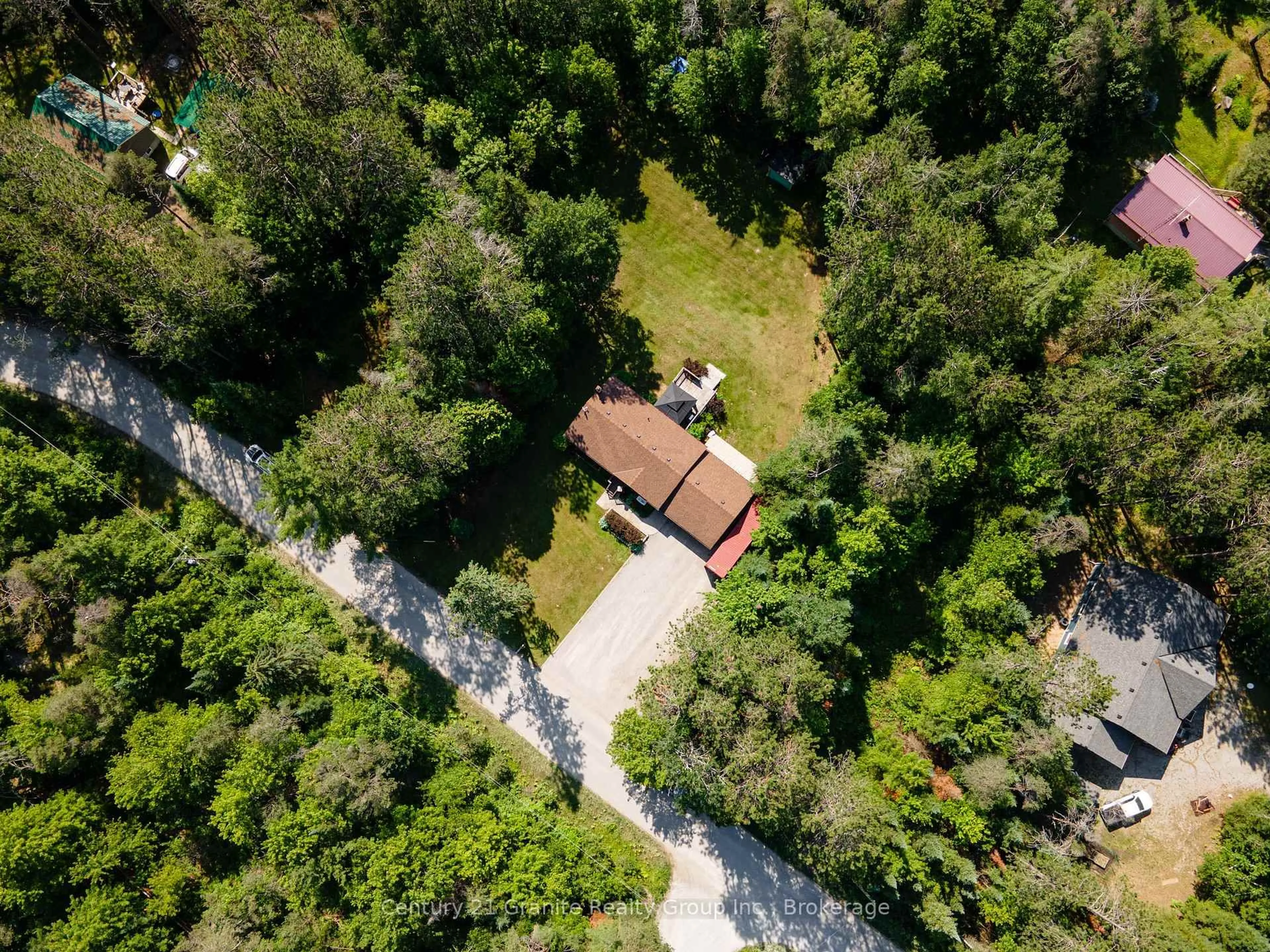 A pic from outside/outdoor area/front of a property/back of a property/a pic from drone, forest/trees view for 1110 Howland Junction Rd, Minden Hills Ontario K0M 2K0