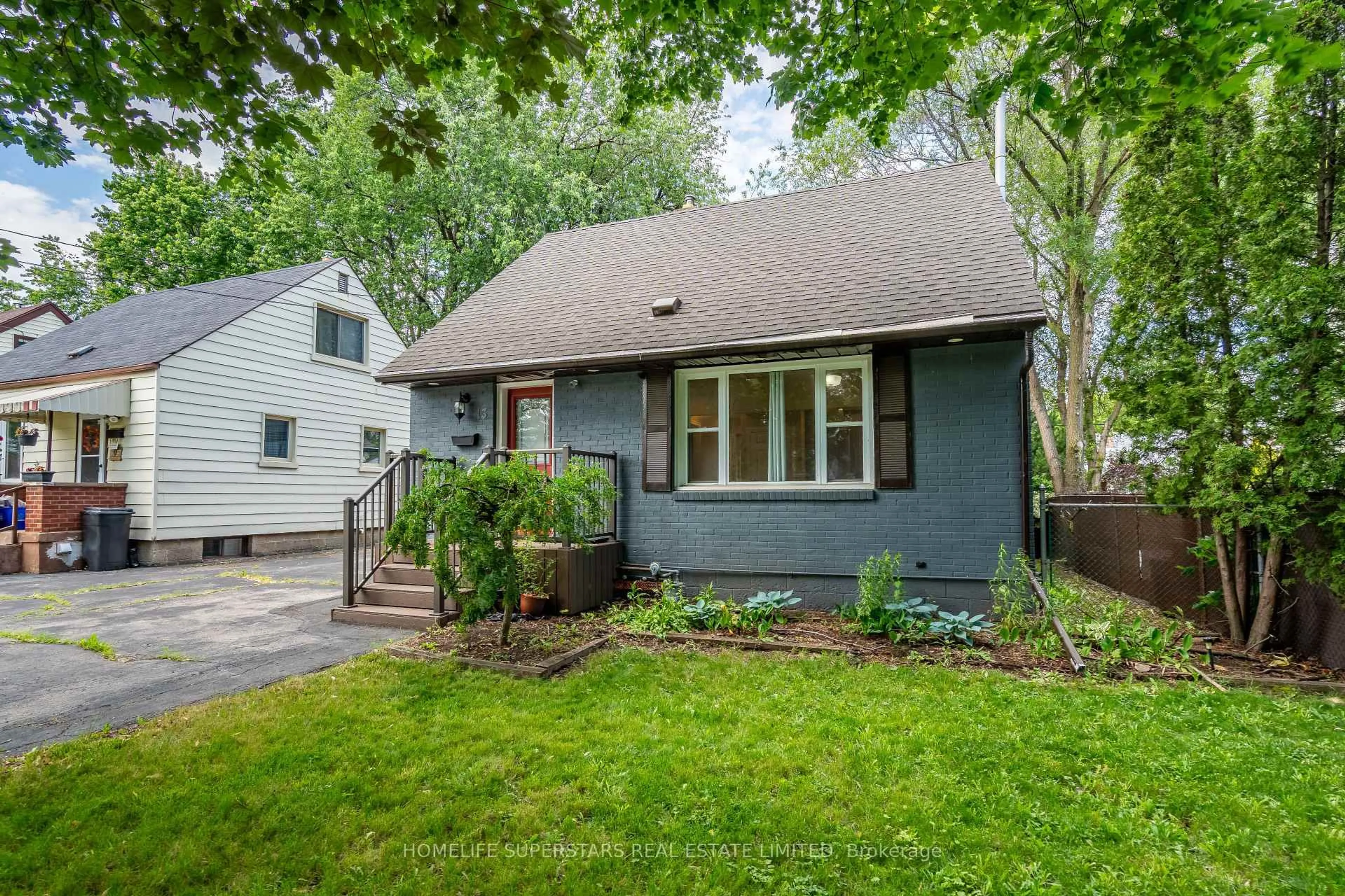 Home with vinyl exterior material, street for 13 Lewis St, Hamilton Ontario L8H 6C3