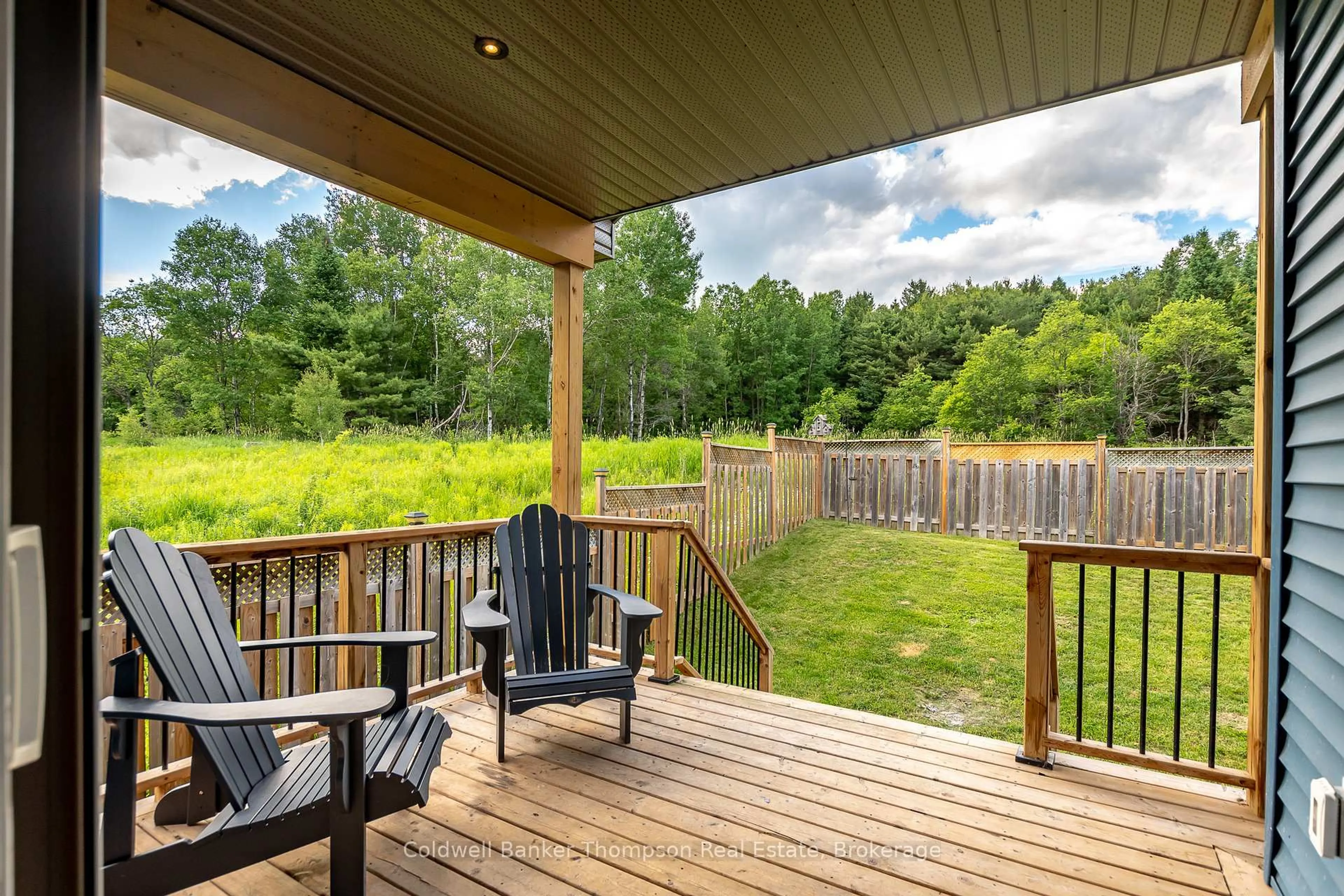 Patio, forest/trees view for 80 Chaffey Township Rd, Huntsville Ontario P1H 1C8