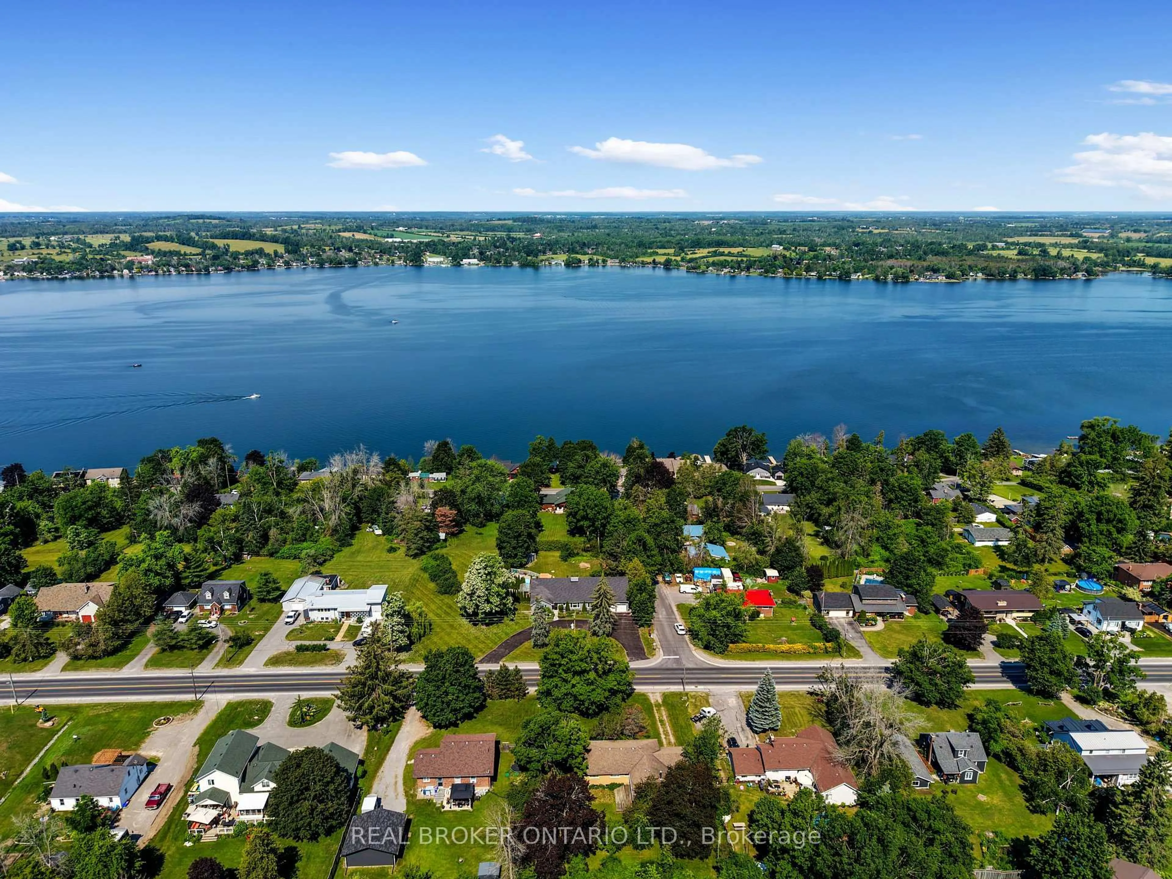 A pic from outside/outdoor area/front of a property/back of a property/a pic from drone, water/lake/river/ocean view for 1018 Ward St, Selwyn Ontario K0L 1H0