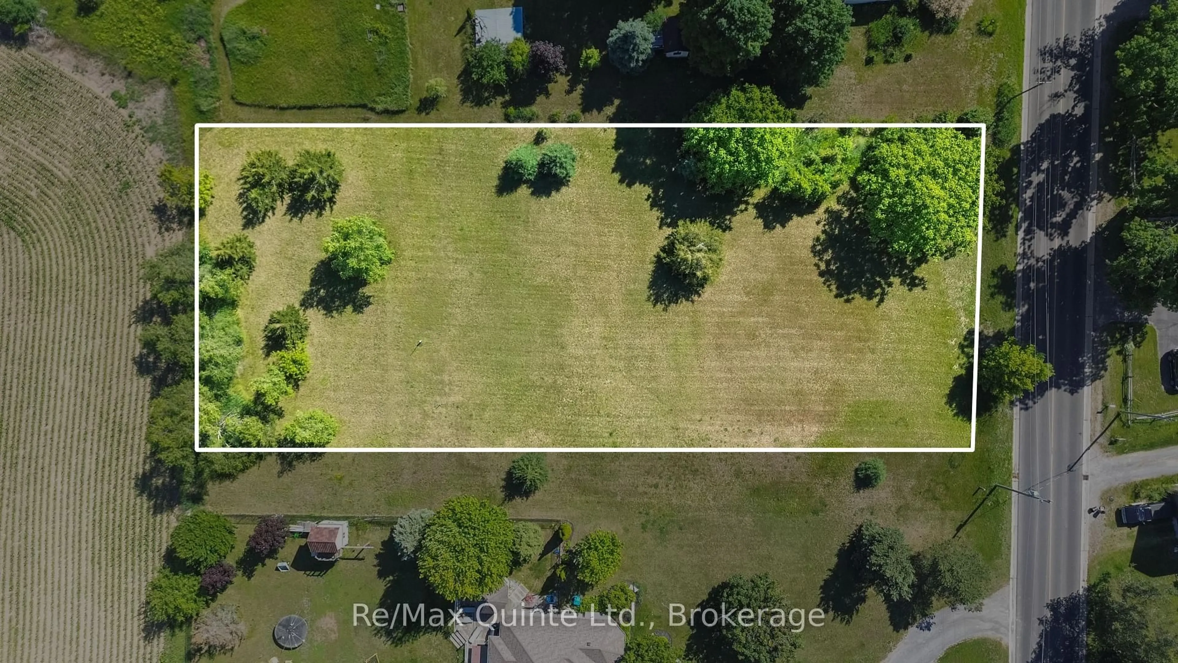 A pic from outside/outdoor area/front of a property/back of a property/a pic from drone, unknown for 1411 County Road 12, Prince Edward County Ontario K0K 2T0