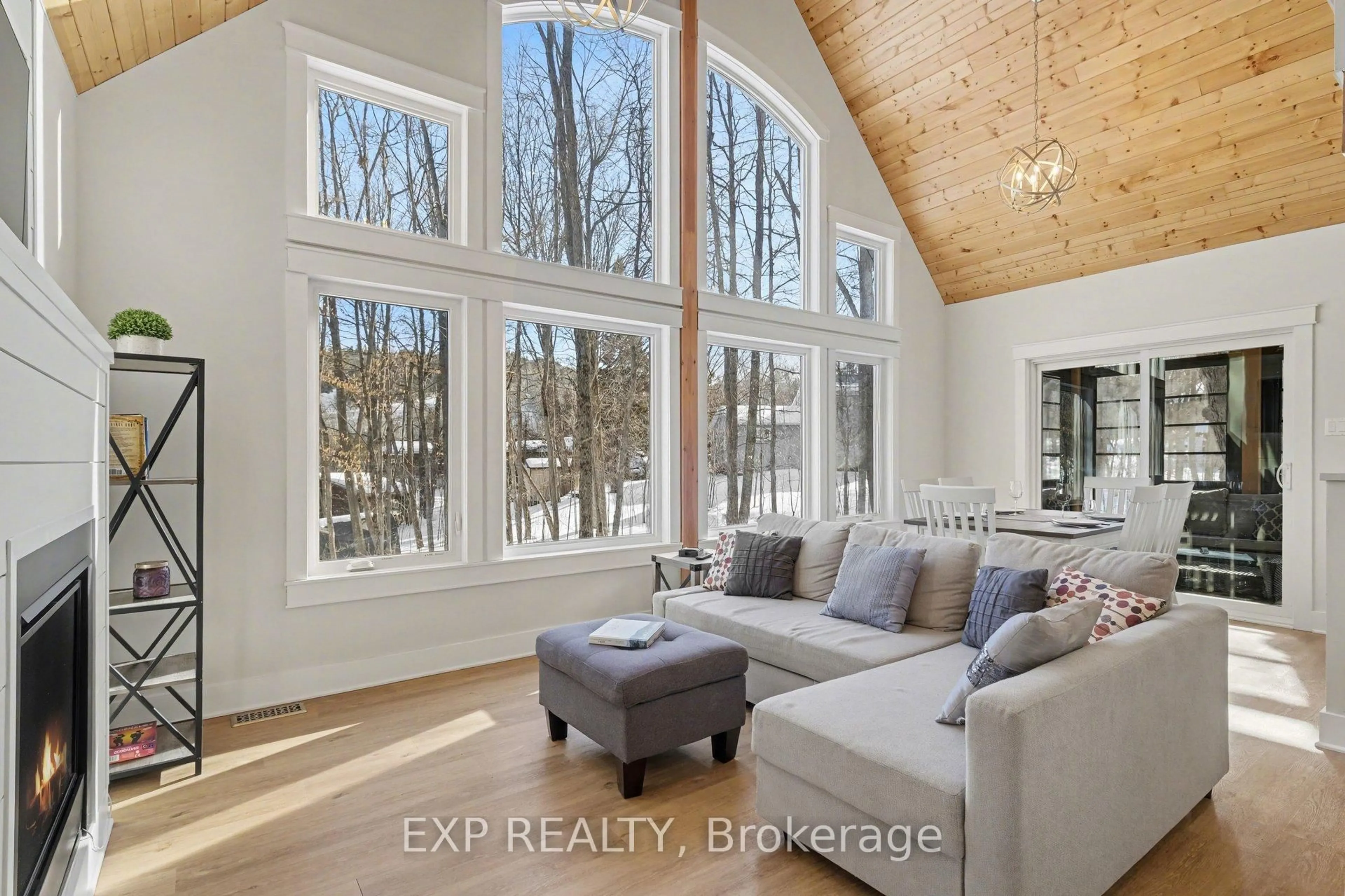 Living room with furniture, wood/laminate floor for 20 Crestview Dr, Calabogie Ontario K0J 1H0