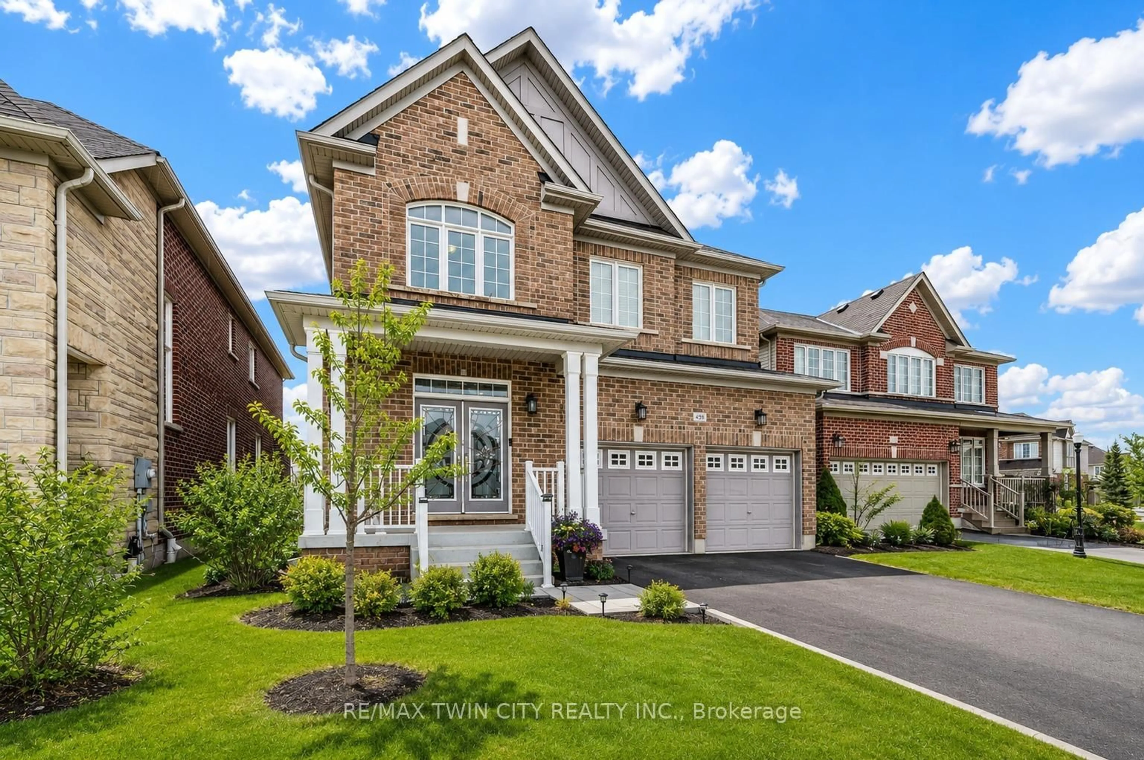 Home with brick exterior material, street for 498 Thomas Slee Dr, Kitchener Ontario N2P 2Y1