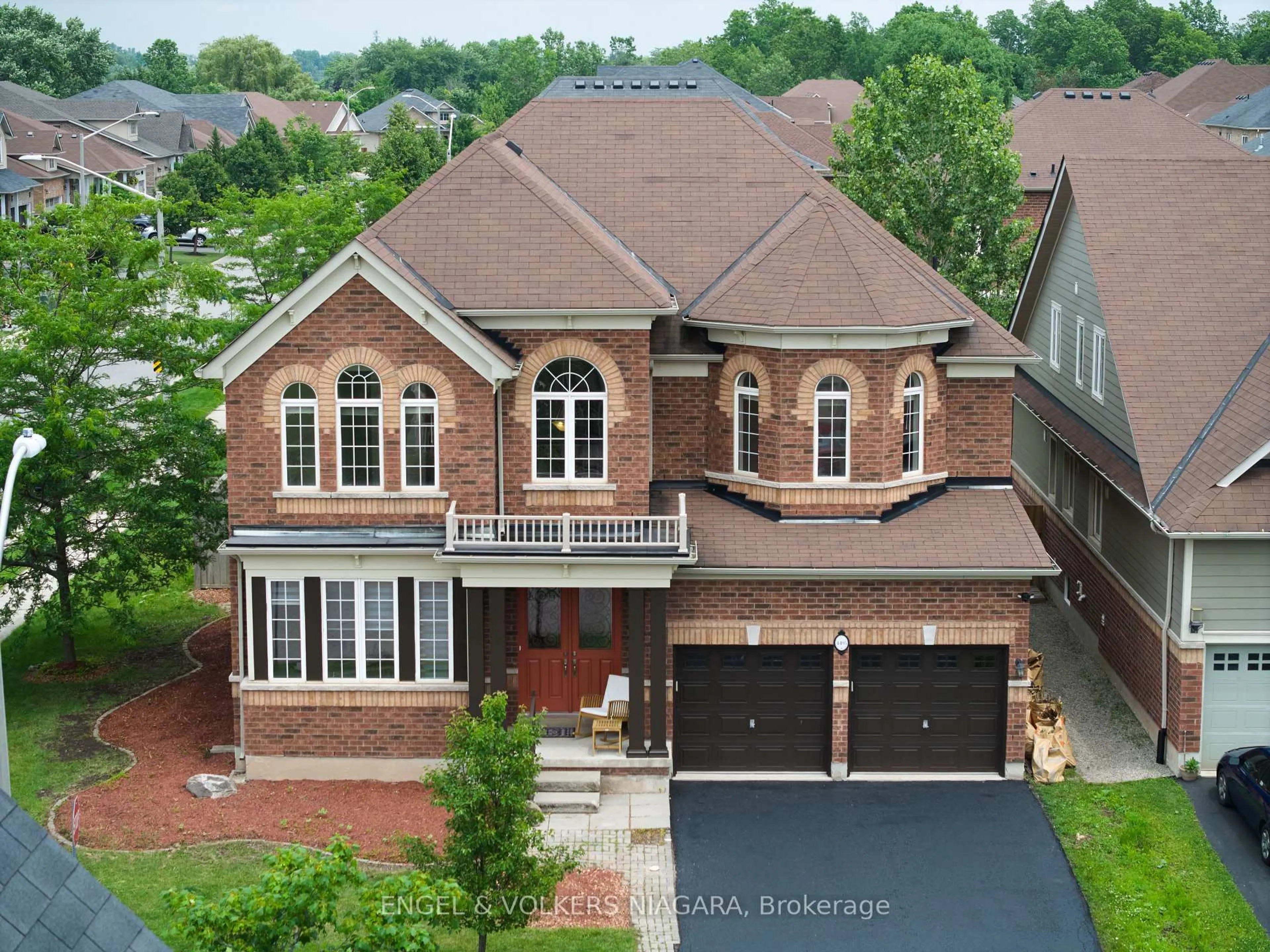 Home with brick exterior material, street for 4495 Saw Mill Dr, Niagara Falls Ontario L2G 0G1