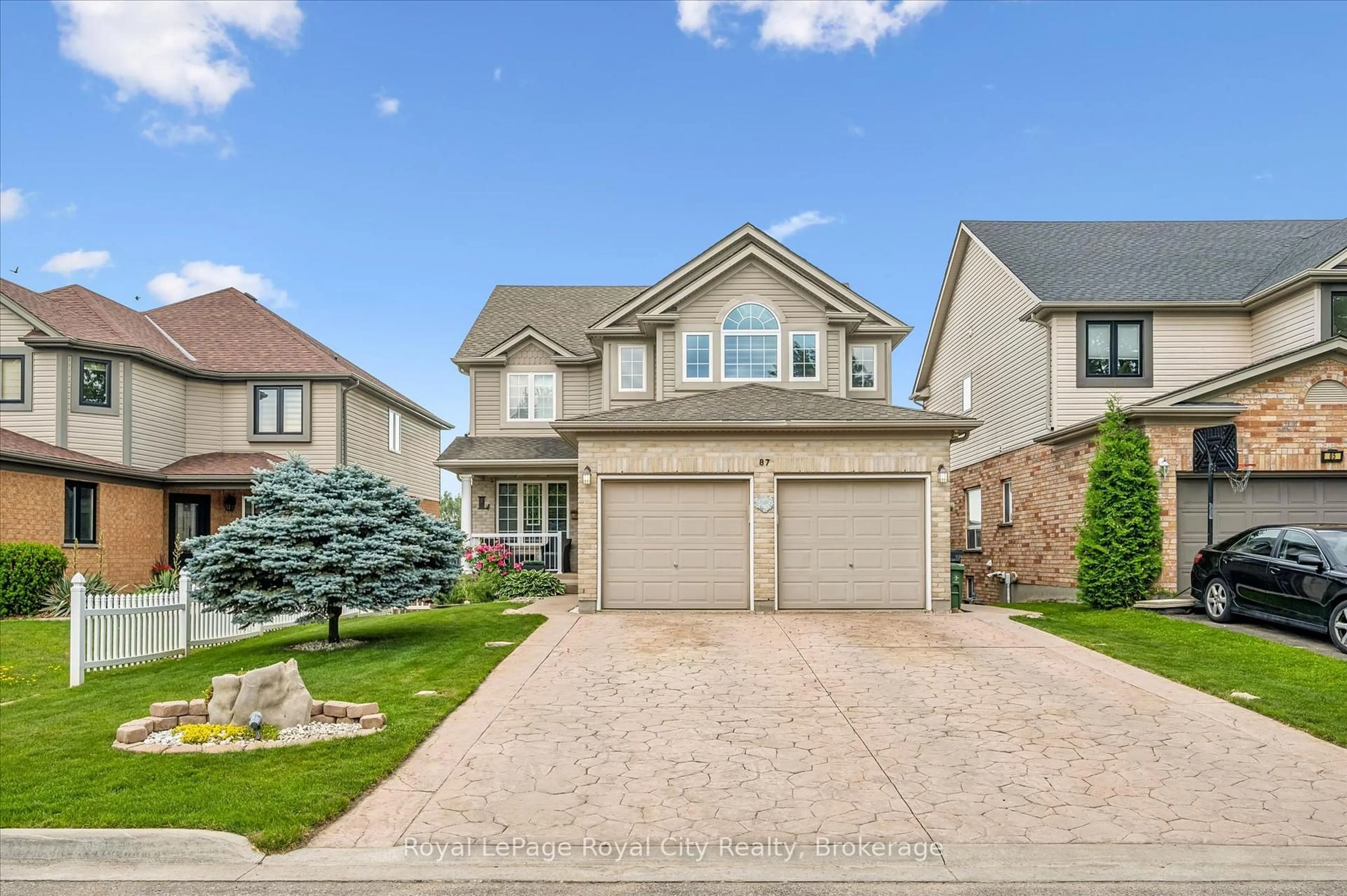 Home with brick exterior material, street for 87 Law Dr, Guelph Ontario N1E 7J7