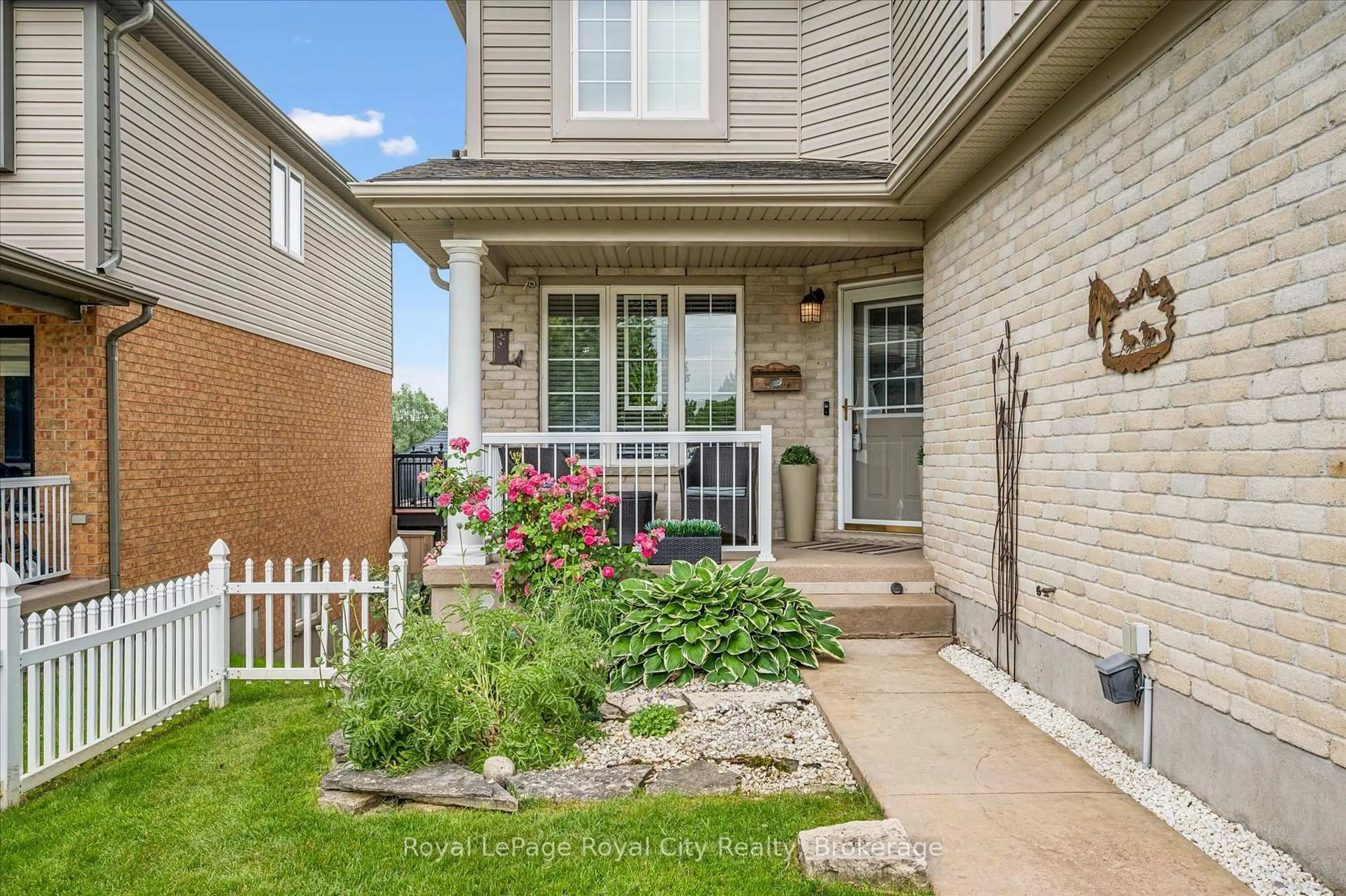 Home with brick exterior material, street for 87 Law Dr, Guelph Ontario N1E 7J7