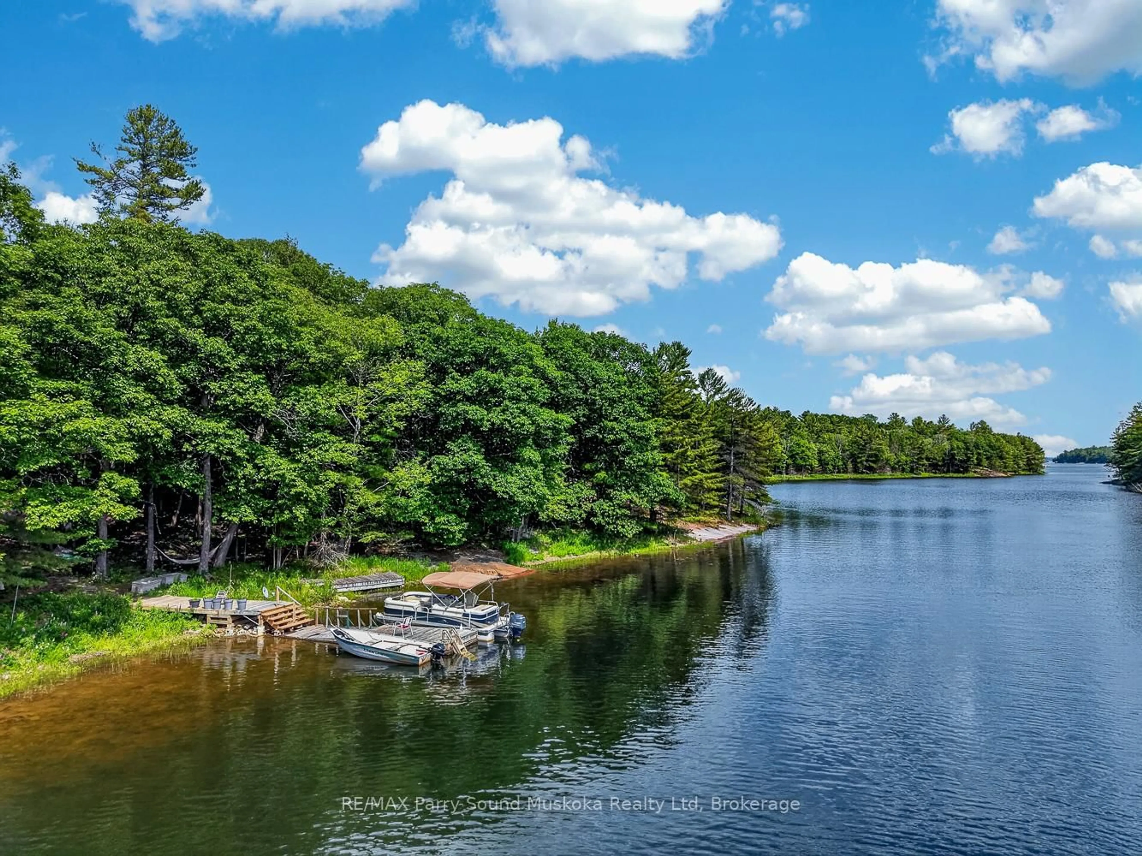 A pic from outside/outdoor area/front of a property/back of a property/a pic from drone, water/lake/river/ocean view for 91 Water Acc Zone Lane, Carling Ontario P0G 1G0