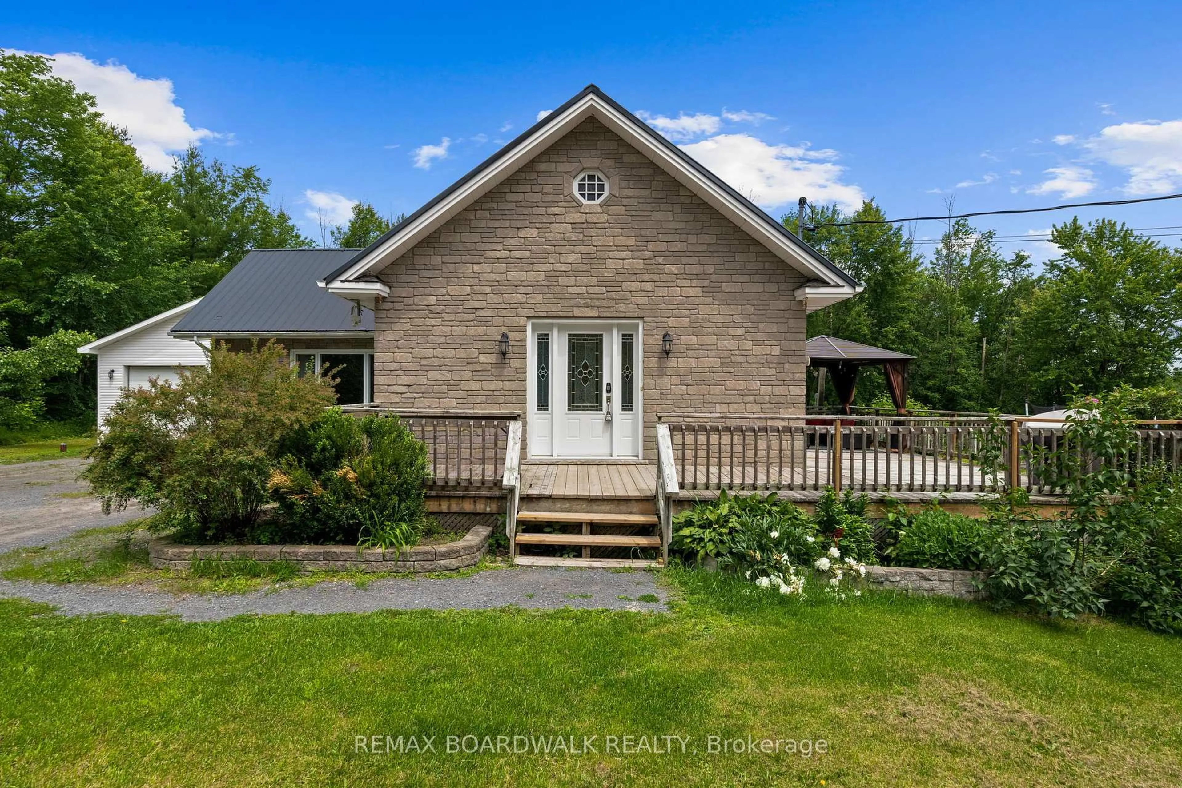 A pic from outside/outdoor area/front of a property/back of a property/a pic from drone, unknown for 1823 Du Lac Chse, Clarence-Rockland Ontario K0A 3N0