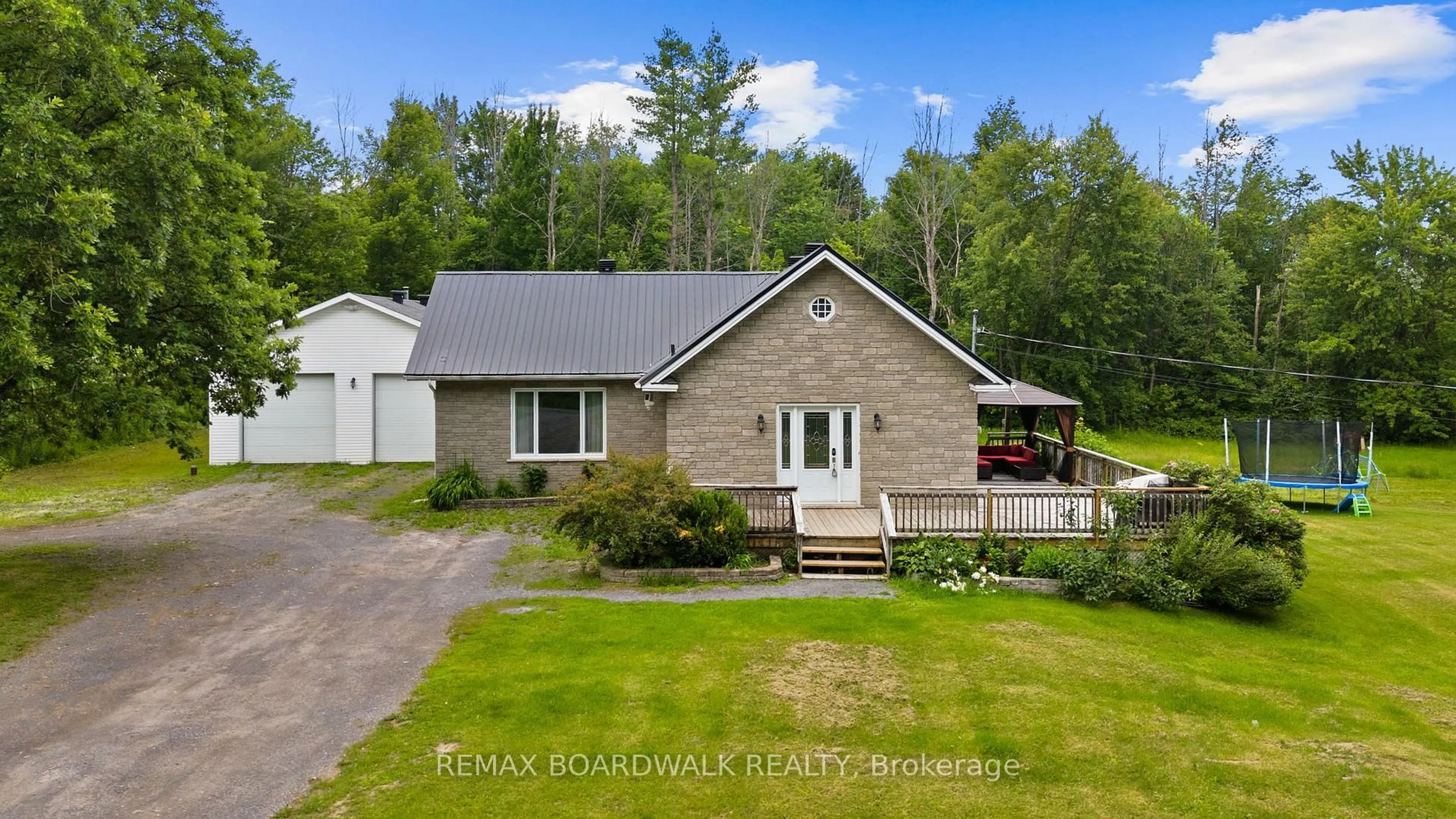 A pic from outside/outdoor area/front of a property/back of a property/a pic from drone, unknown for 1823 Du Lac Chse, Clarence-Rockland Ontario K0A 3N0