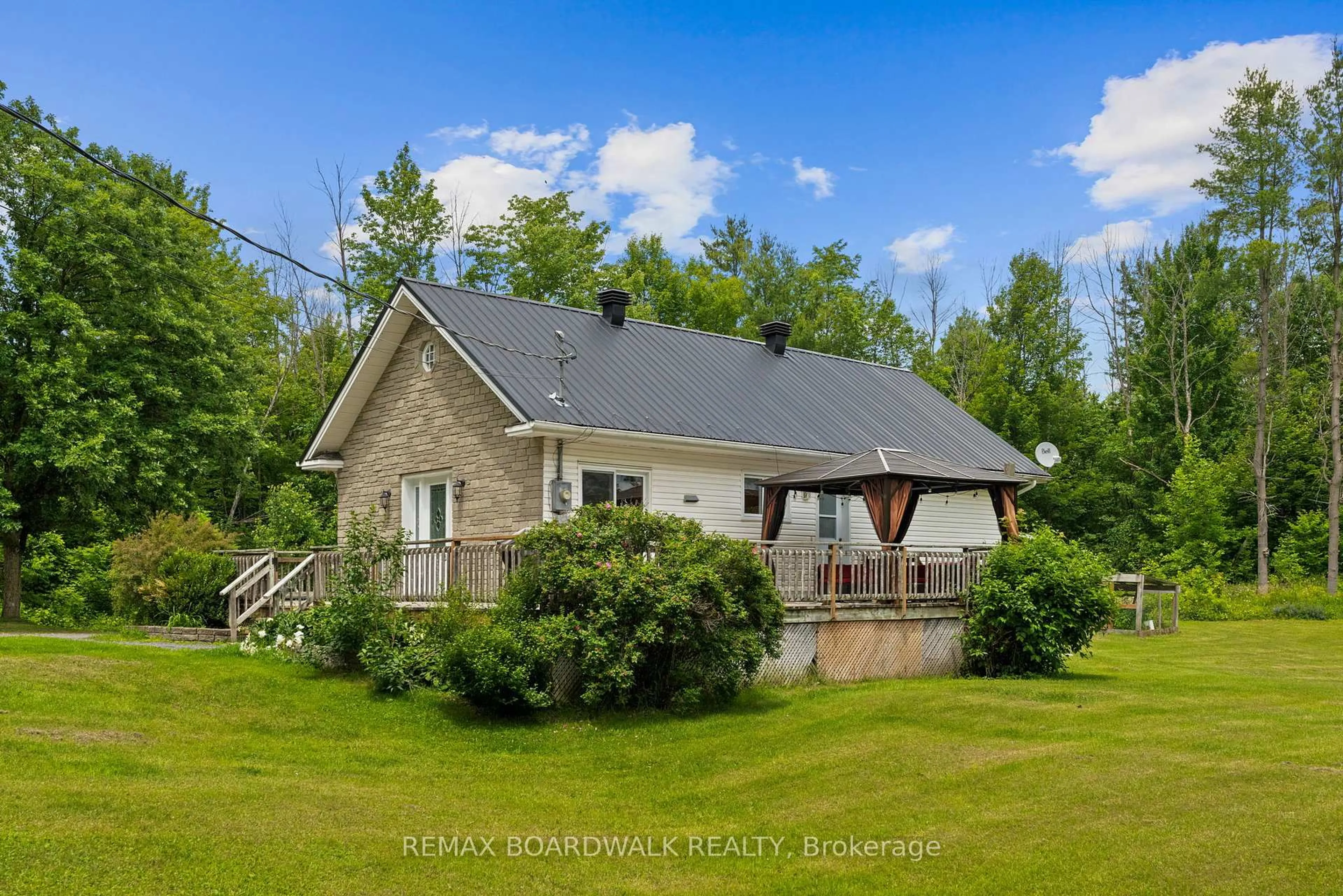 A pic from outside/outdoor area/front of a property/back of a property/a pic from drone, water/lake/river/ocean view for 1823 Du Lac Chse, Clarence-Rockland Ontario K0A 3N0