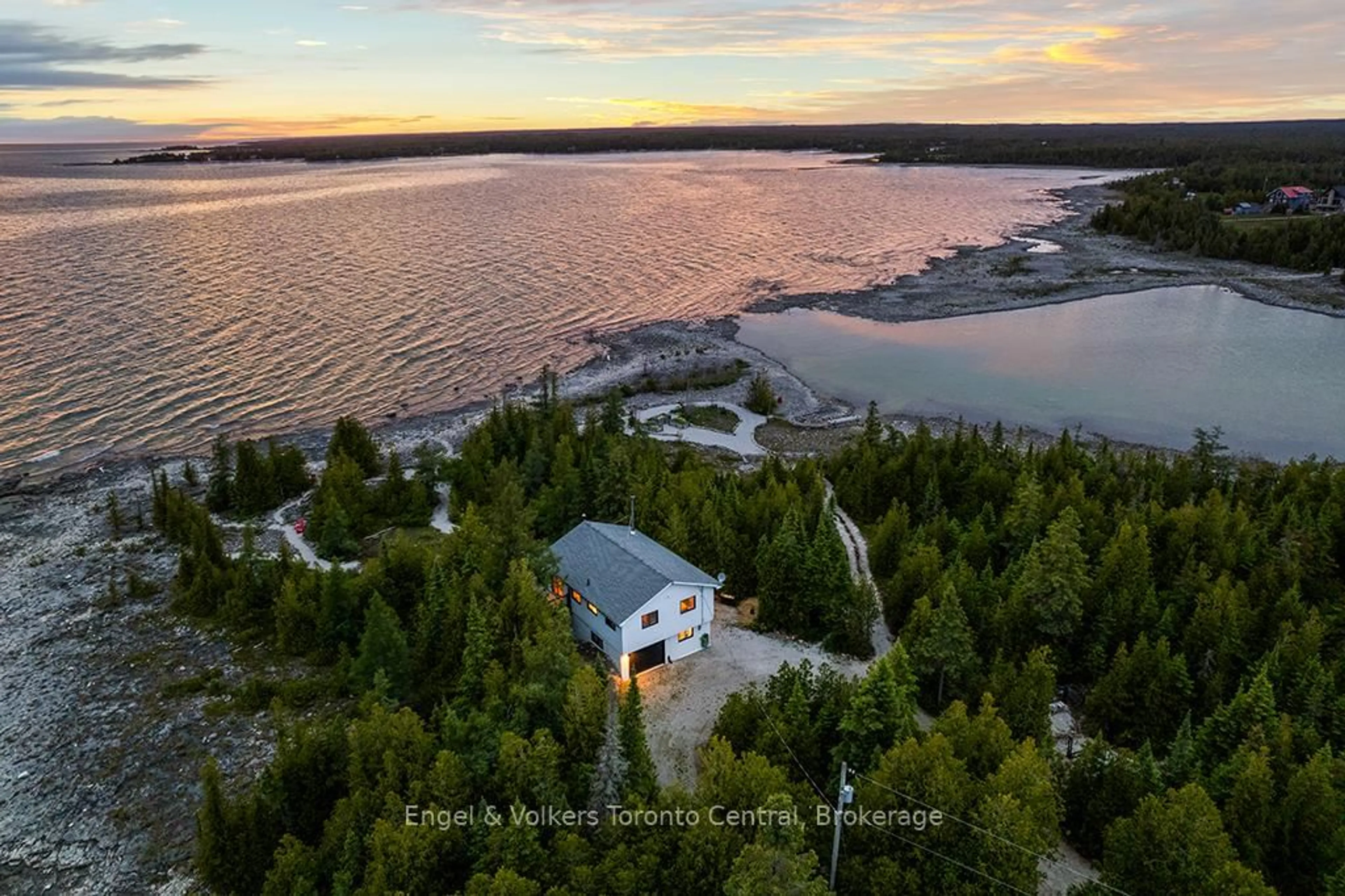 A pic from outside/outdoor area/front of a property/back of a property/a pic from drone, water/lake/river/ocean view for 64 Larsen Cove Rd, Northern Bruce Peninsula Ontario N0H 1Z0