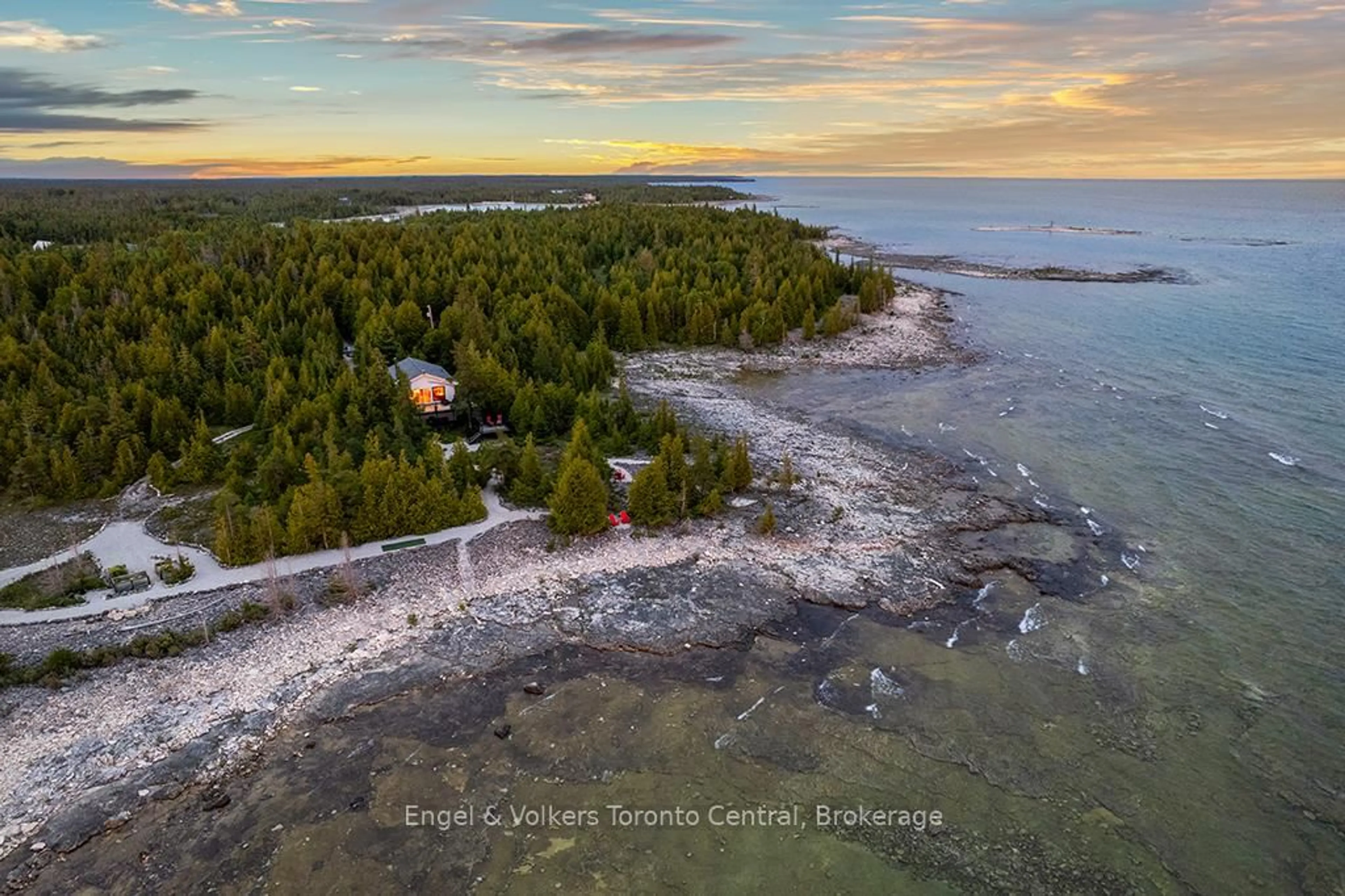 A pic from outside/outdoor area/front of a property/back of a property/a pic from drone, water/lake/river/ocean view for 64 Larsen Cove Rd, Northern Bruce Peninsula Ontario N0H 1Z0