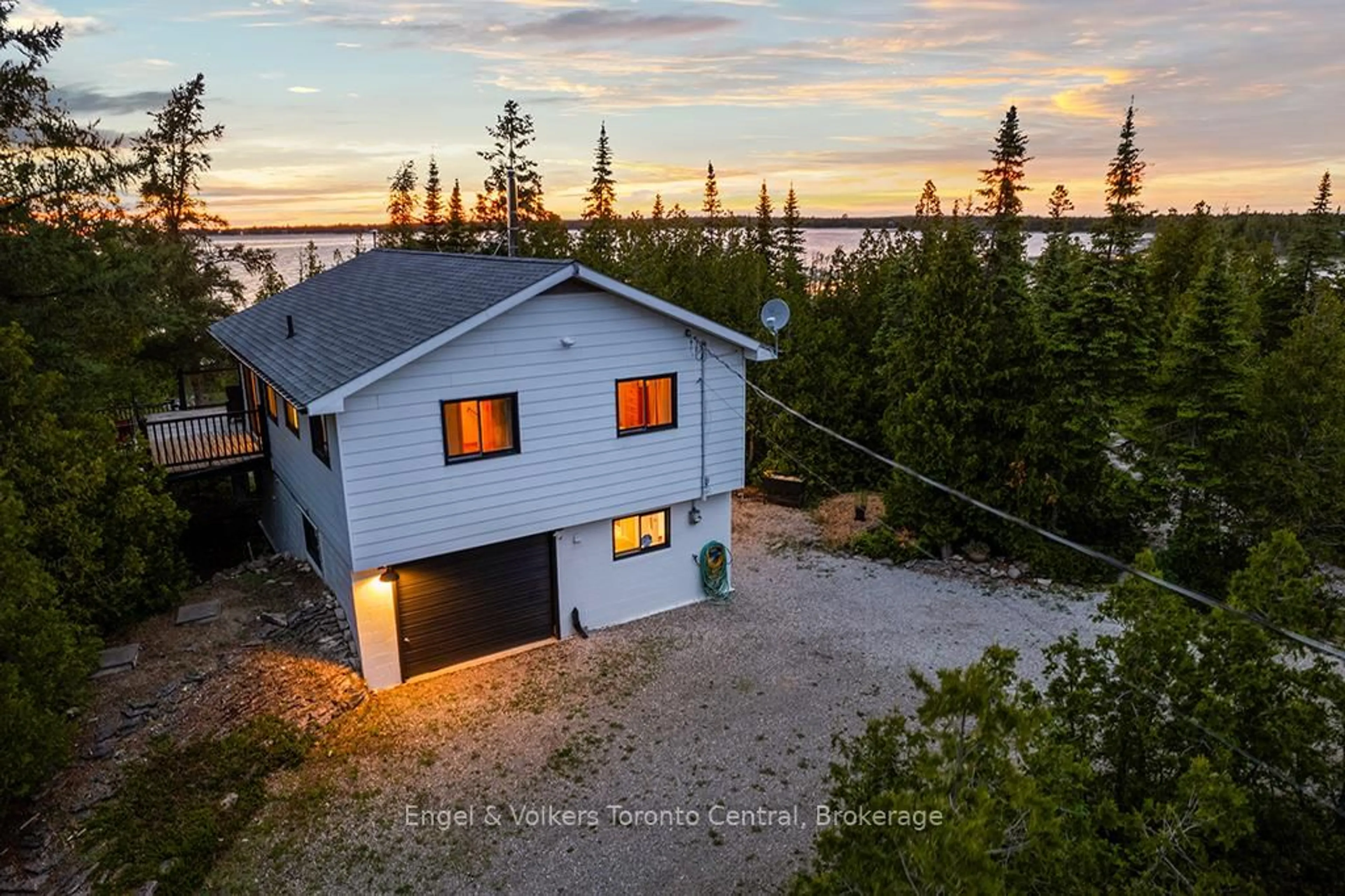 A pic from outside/outdoor area/front of a property/back of a property/a pic from drone, water/lake/river/ocean view for 64 Larsen Cove Rd, Northern Bruce Peninsula Ontario N0H 1Z0