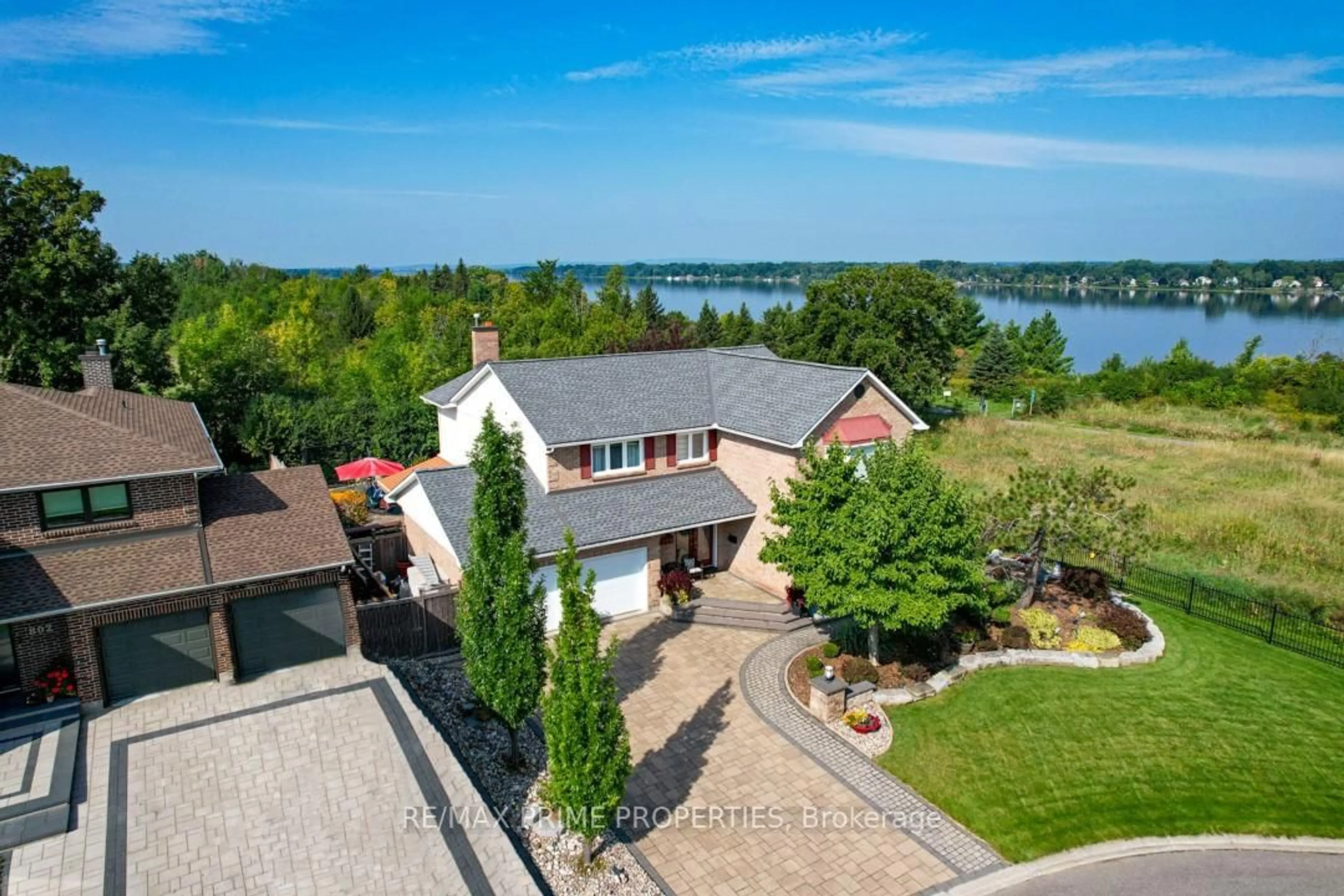 A pic from outside/outdoor area/front of a property/back of a property/a pic from drone, water/lake/river/ocean view for 800 Fairwinds Terr, Orleans Ontario K1C 2X6