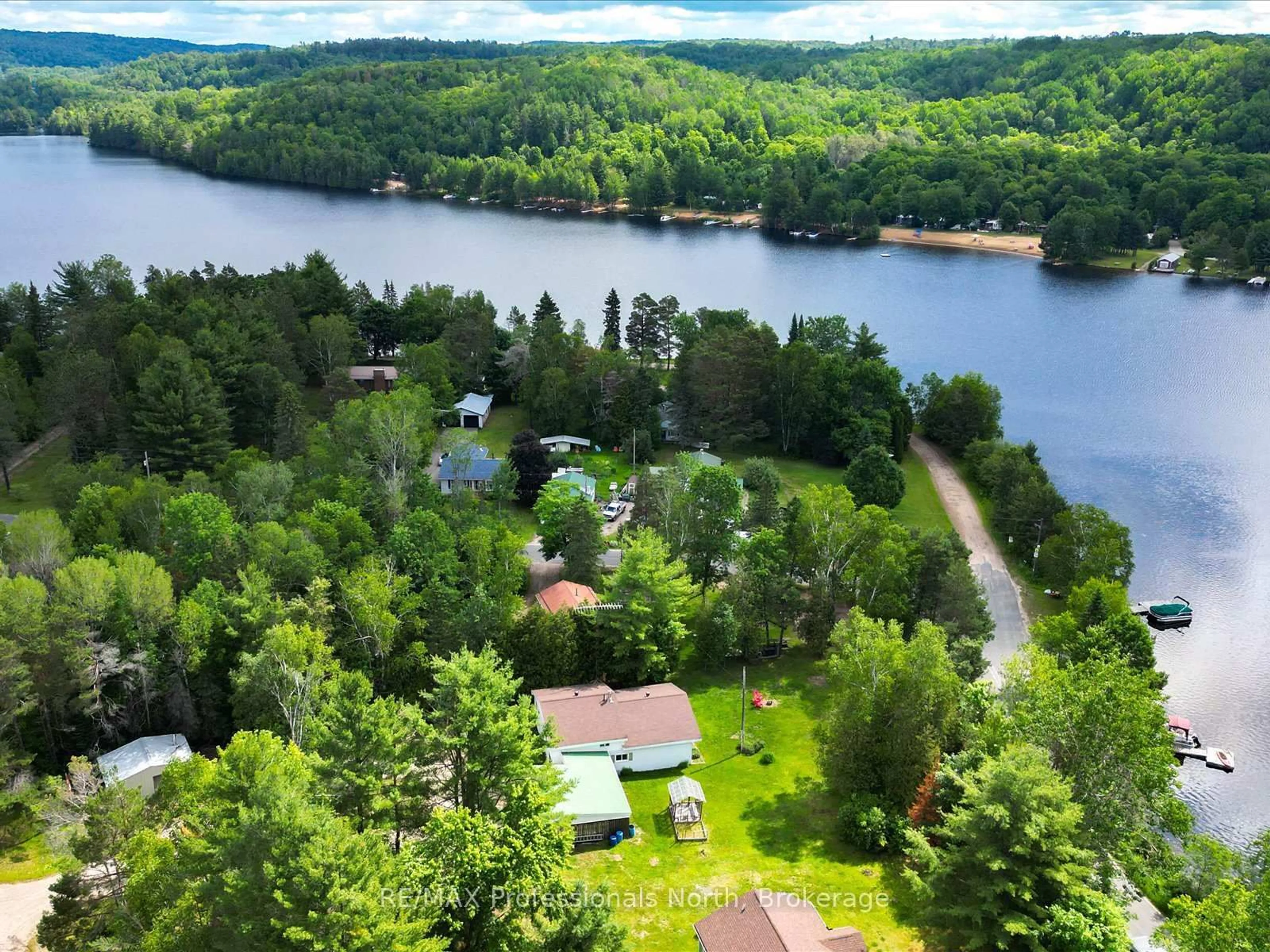 A pic from outside/outdoor area/front of a property/back of a property/a pic from drone, water/lake/river/ocean view for 2510 Loop Rd, Highlands East Ontario K0L 3C0