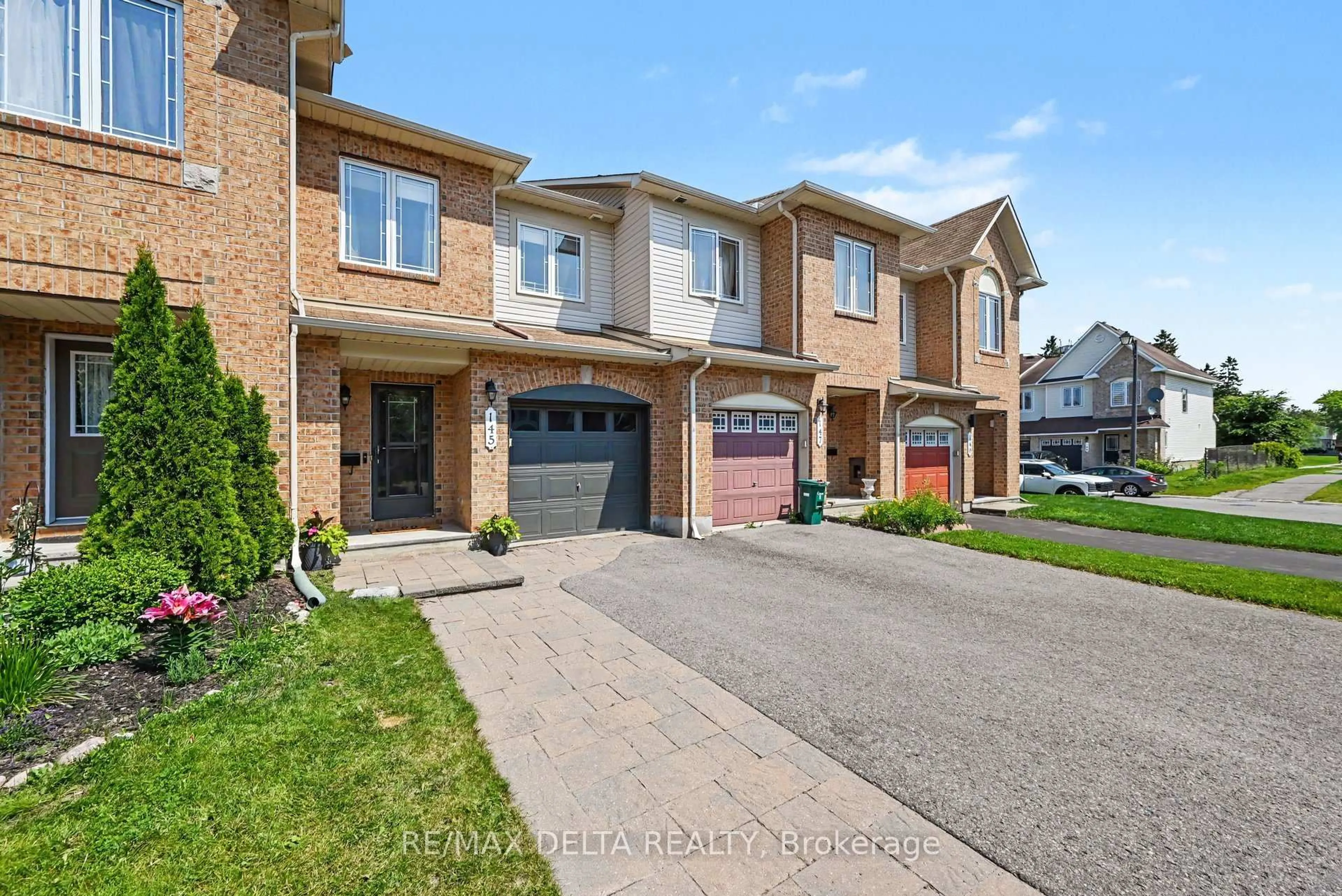 Home with brick exterior material, street for 145 Marrissa Ave, Ottawa Ontario K1J 0A4