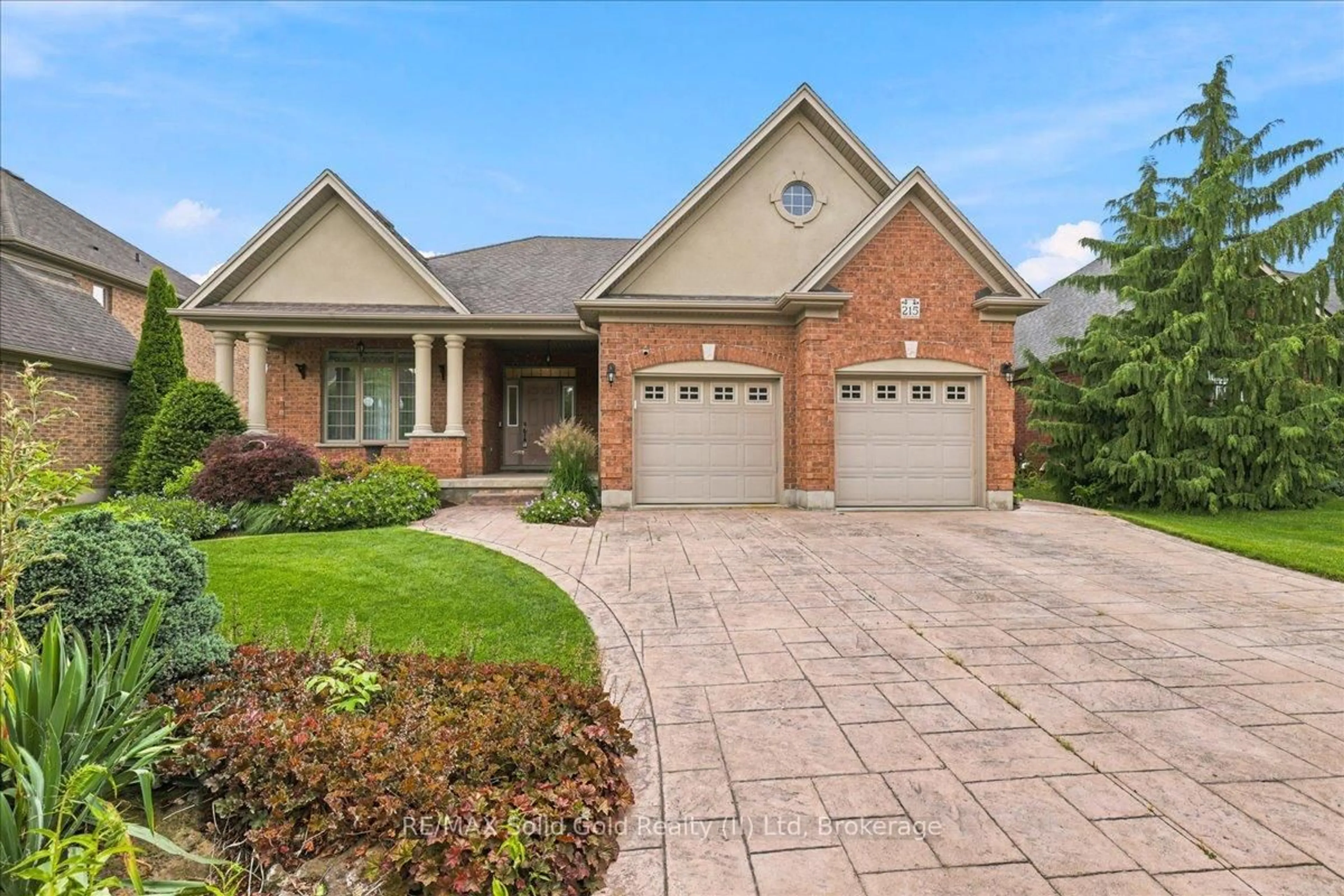 Home with brick exterior material, street for 215 Terrace Wood Cres, Kitchener Ontario N2P 2T3