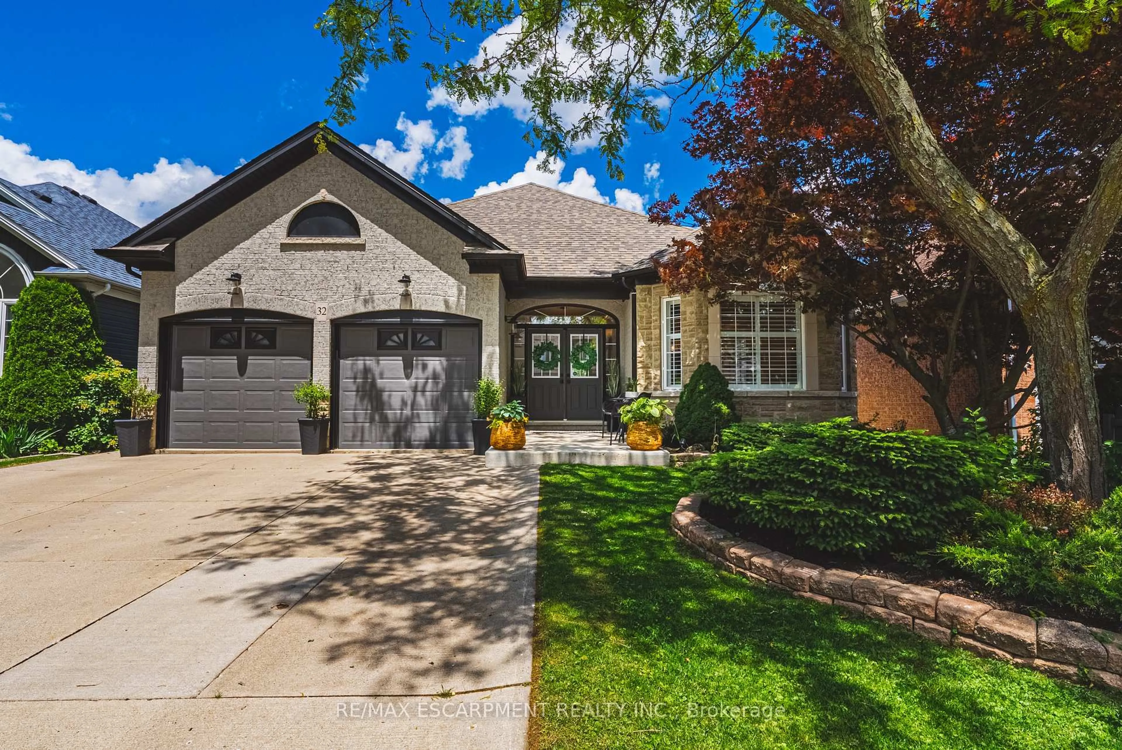 Home with brick exterior material, street for 32 Kopperfield Lane, Hamilton Ontario L0R 1W0
