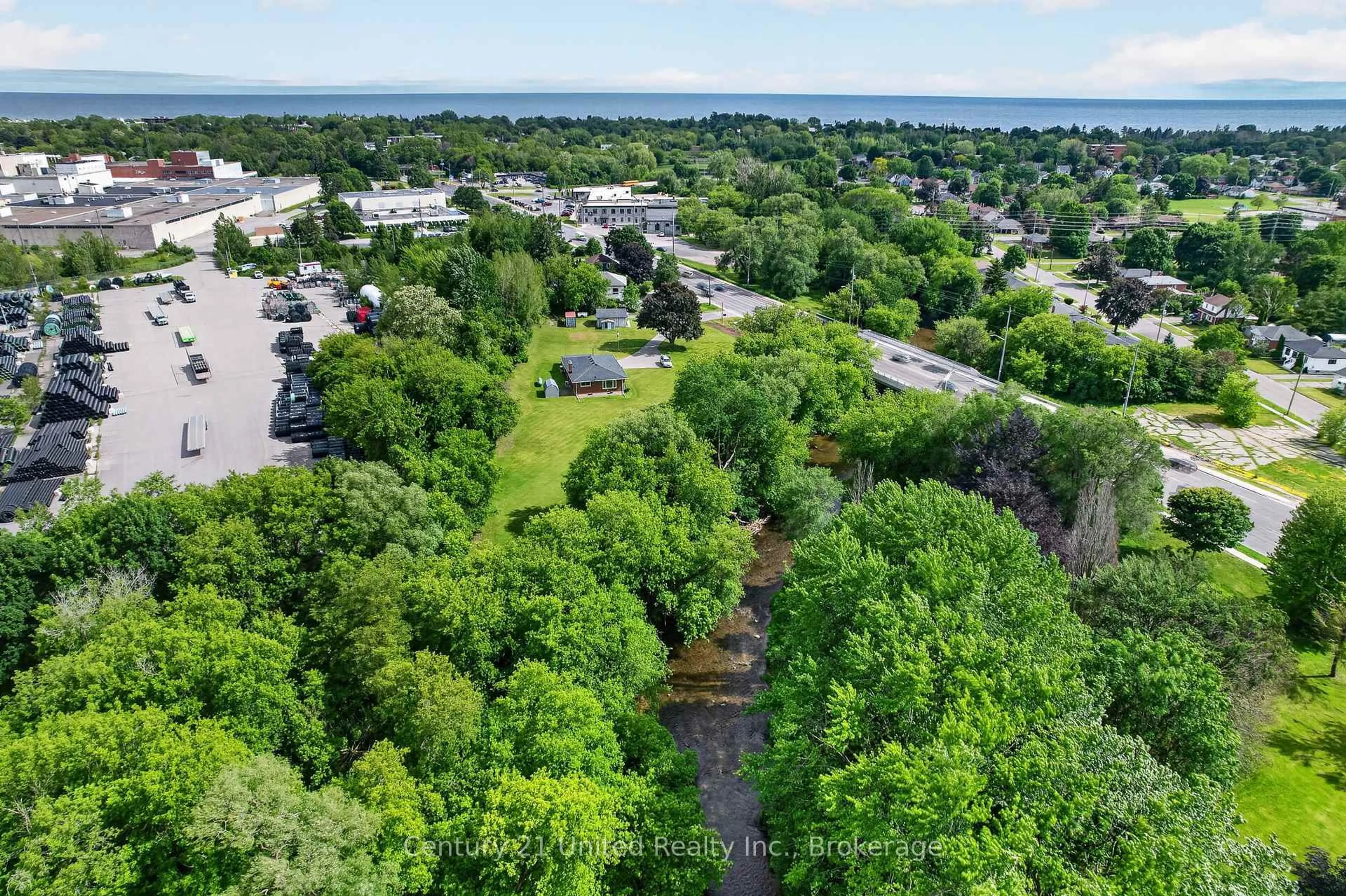 A pic from outside/outdoor area/front of a property/back of a property/a pic from drone, water/lake/river/ocean view for 670 William St, Cobourg Ontario K9A 3A5