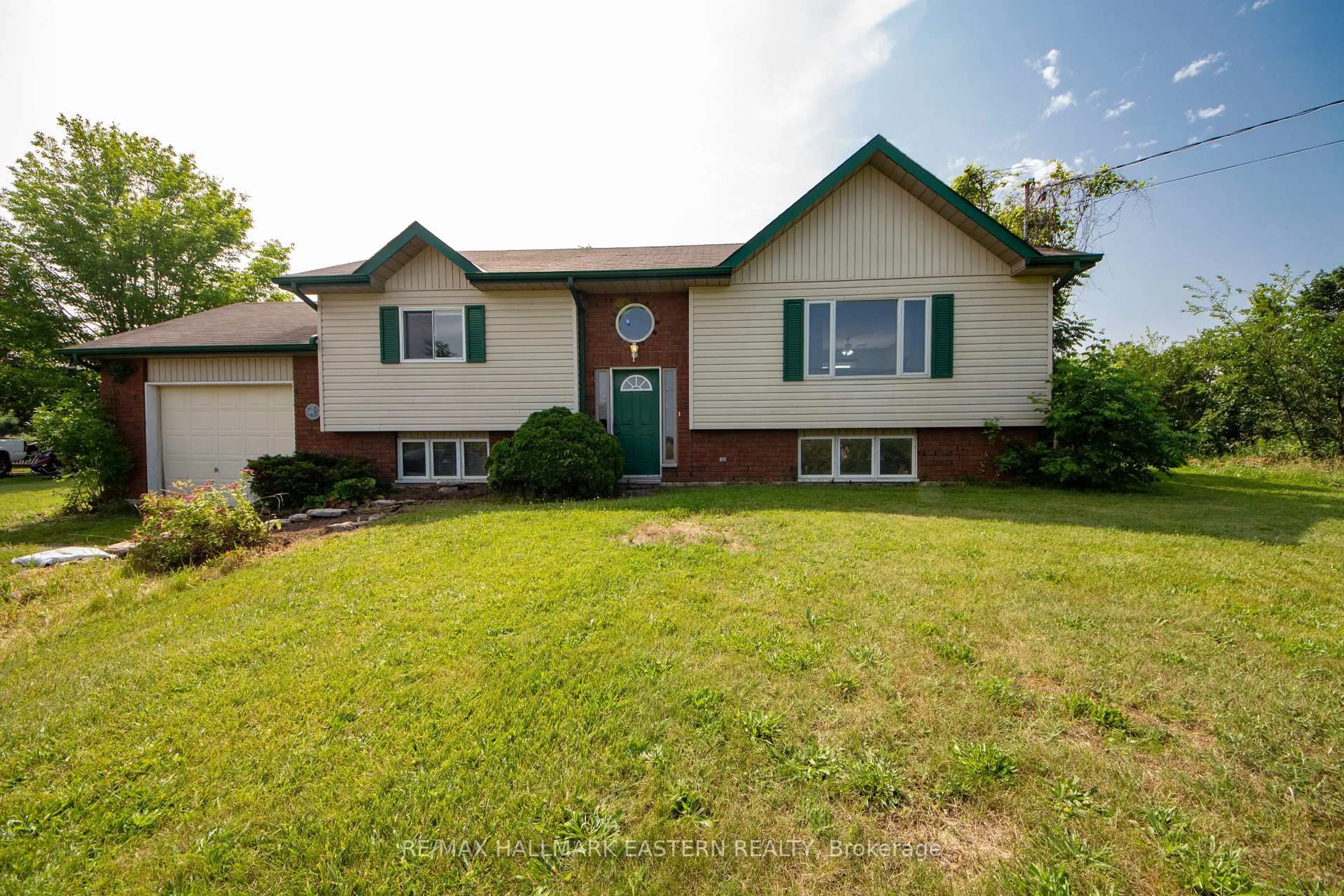 Home with vinyl exterior material, street for 945 Highland Rd, Selwyn Ontario K0L 1H0