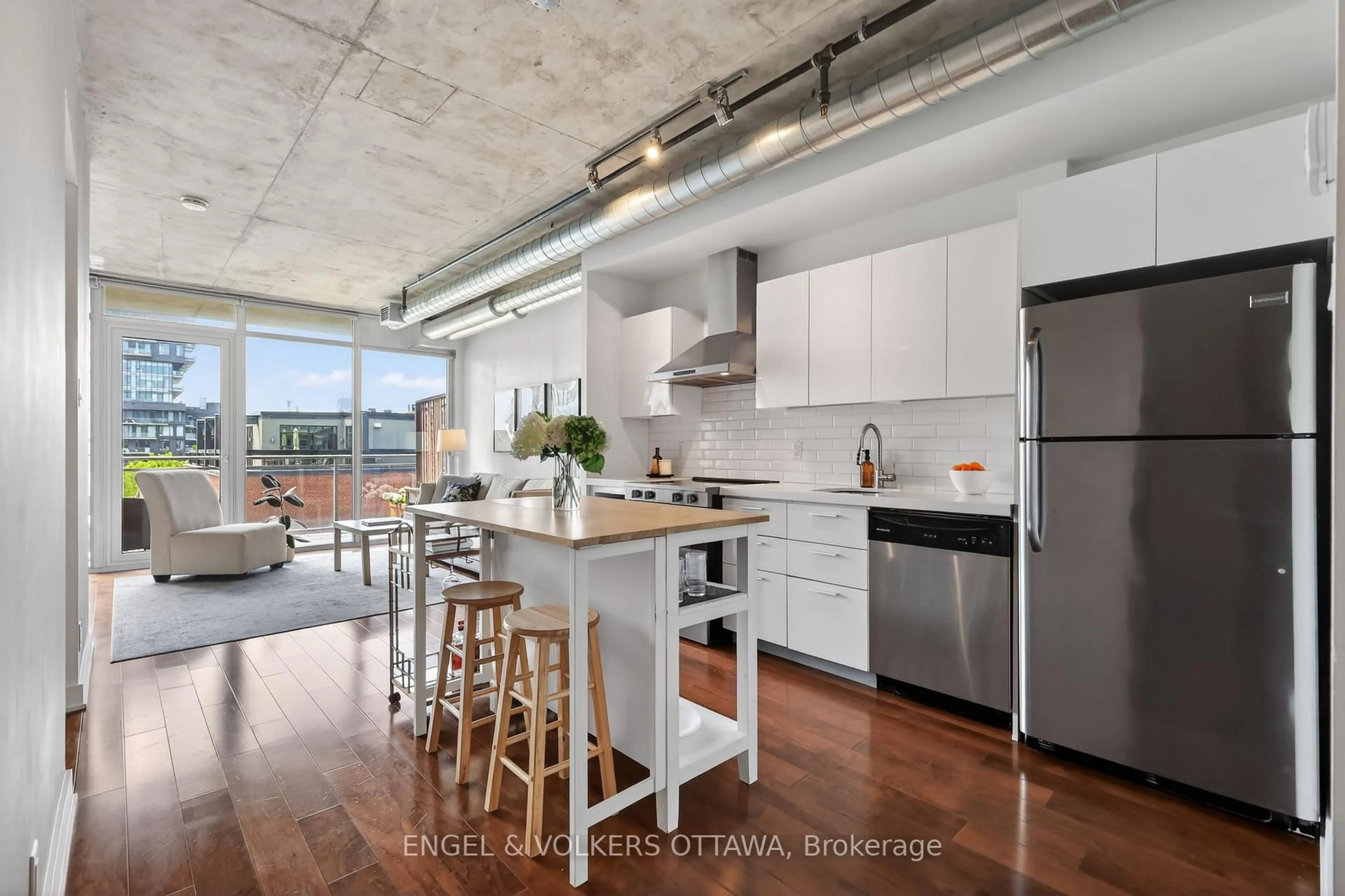 Open concept kitchen, cement floor for 340 Mcleod St #533, Ottawa Ontario K2P 1A4