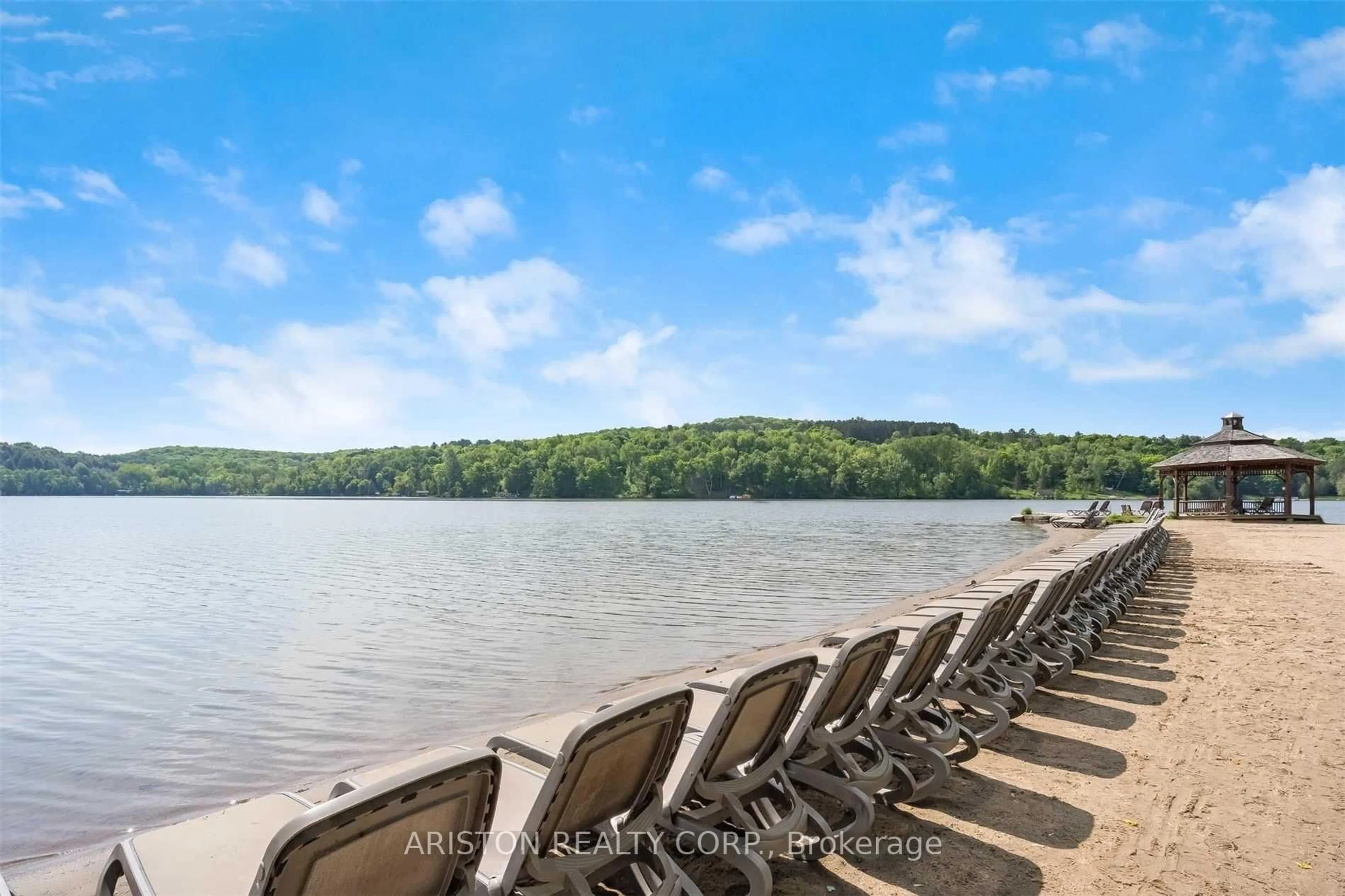Patio, water/lake/river/ocean view for 1 Deerhurst Dr #419, Huntsville Ontario P1H 1A9