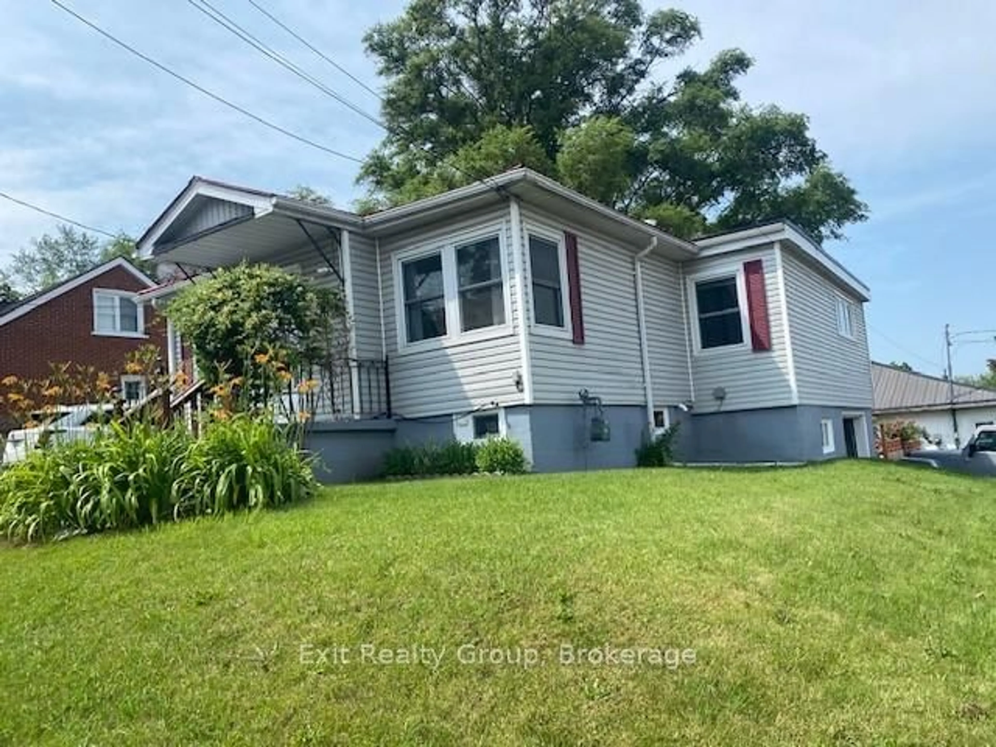 Home with vinyl exterior material, street for 404 Bleecker Ave, Belleville Ontario K8N 3V8