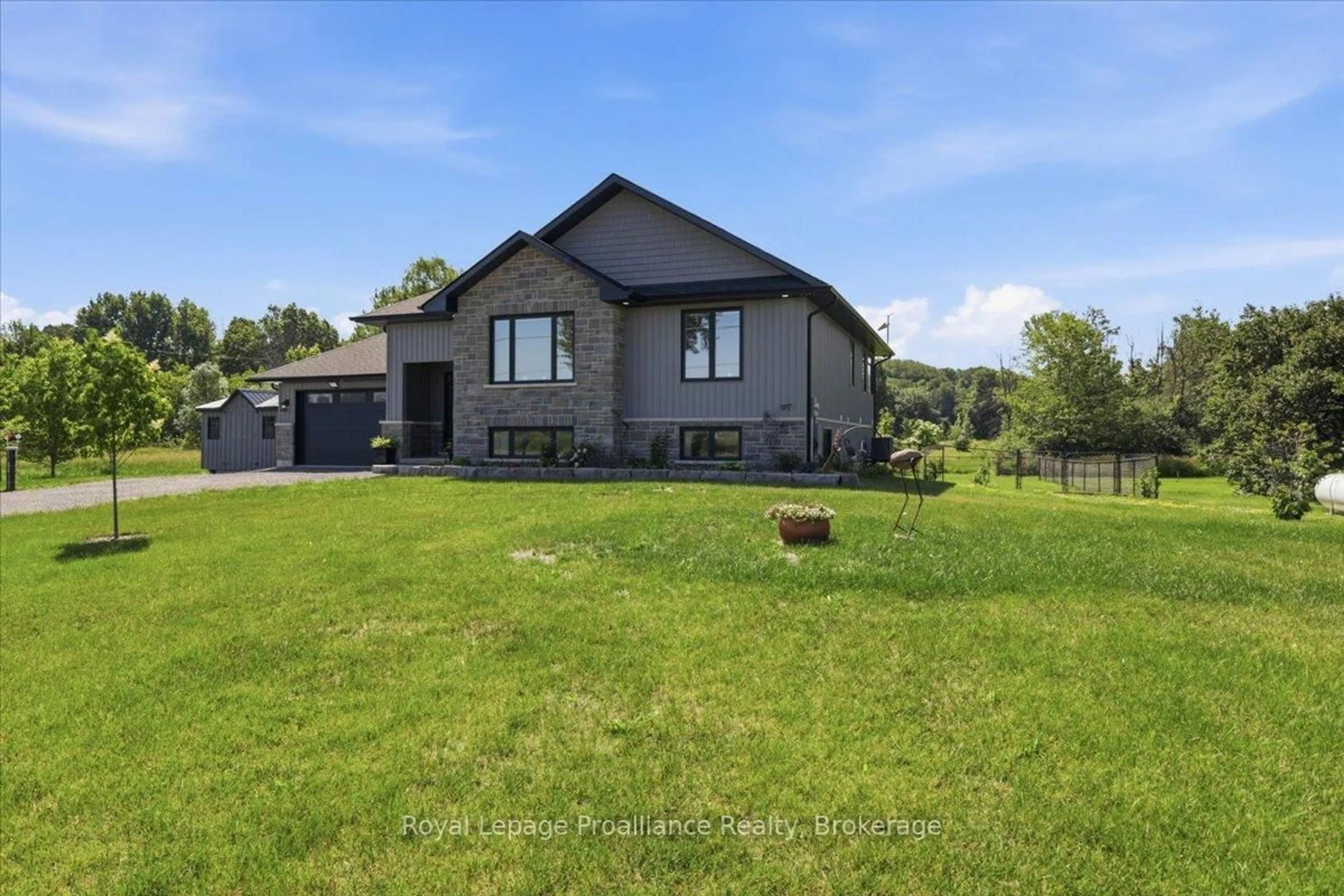 A pic from outside/outdoor area/front of a property/back of a property/a pic from drone, unknown for 564 Willett Rd, Belleville Ontario K0K 2Y0