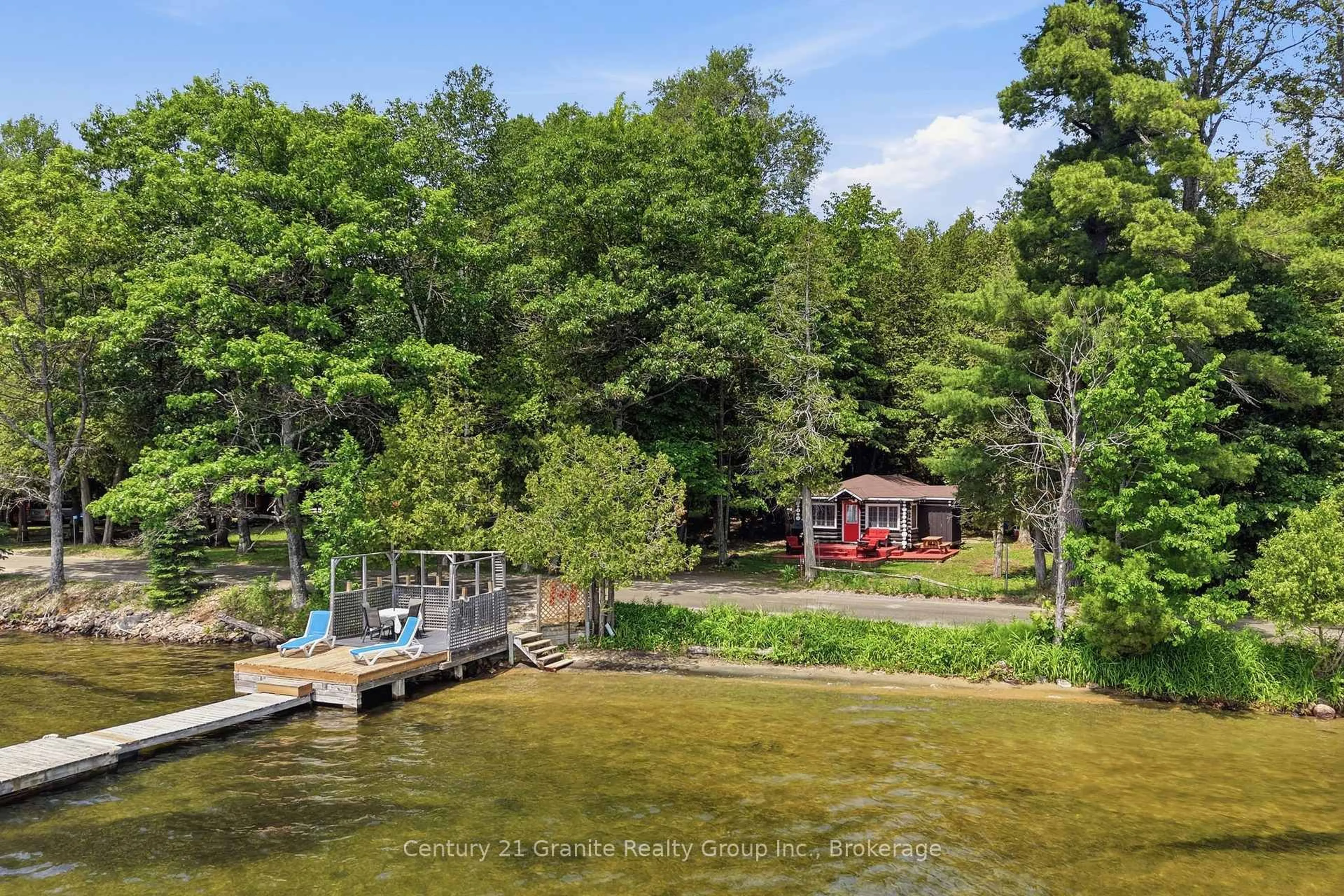 A pic from outside/outdoor area/front of a property/back of a property/a pic from drone, water/lake/river/ocean view for 1163 REYNOLDS Rd, Minden Hills Ontario K0M 2K0
