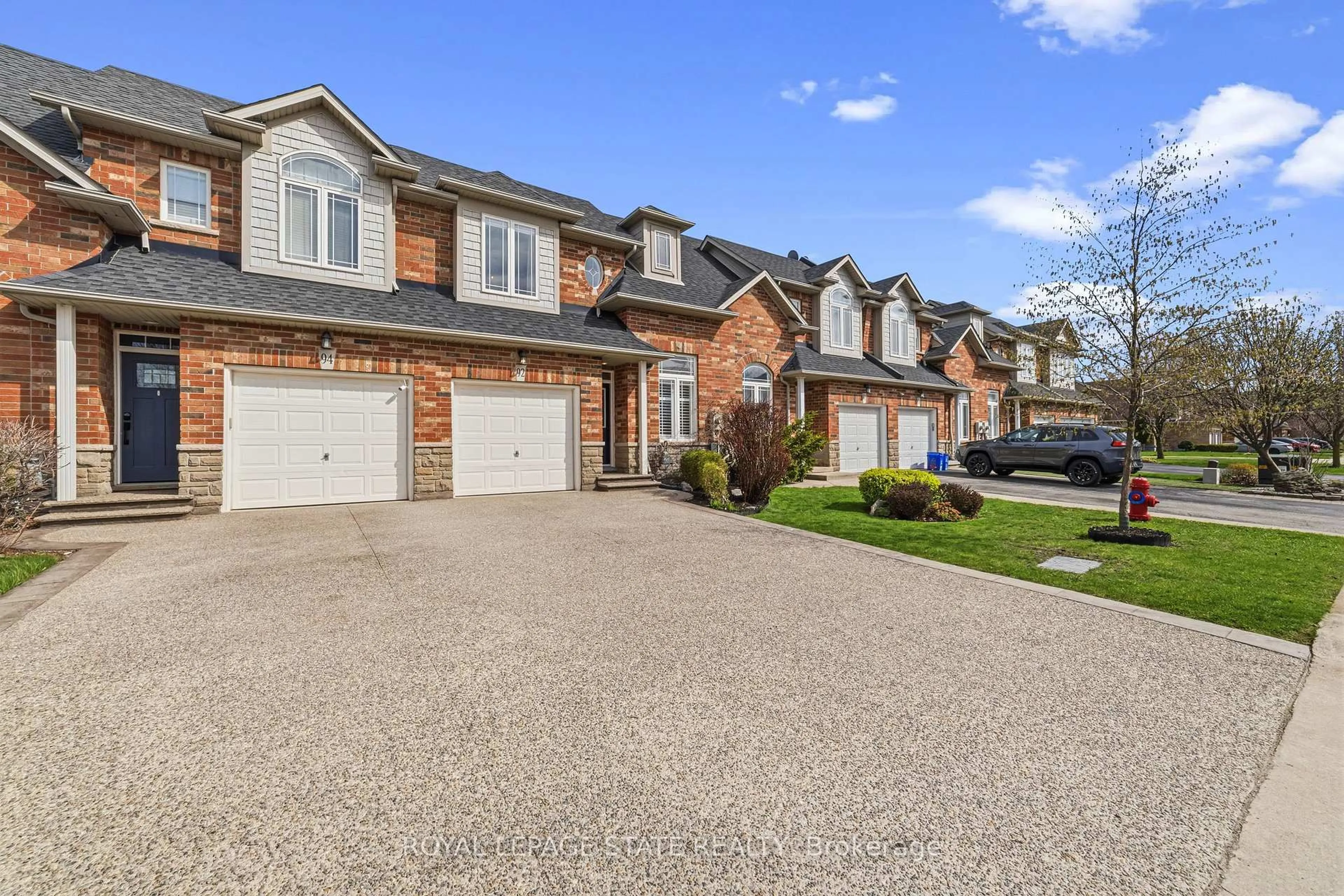 Home with brick exterior material, street for 92 Benziger Lane, Hamilton Ontario L8E 6G5