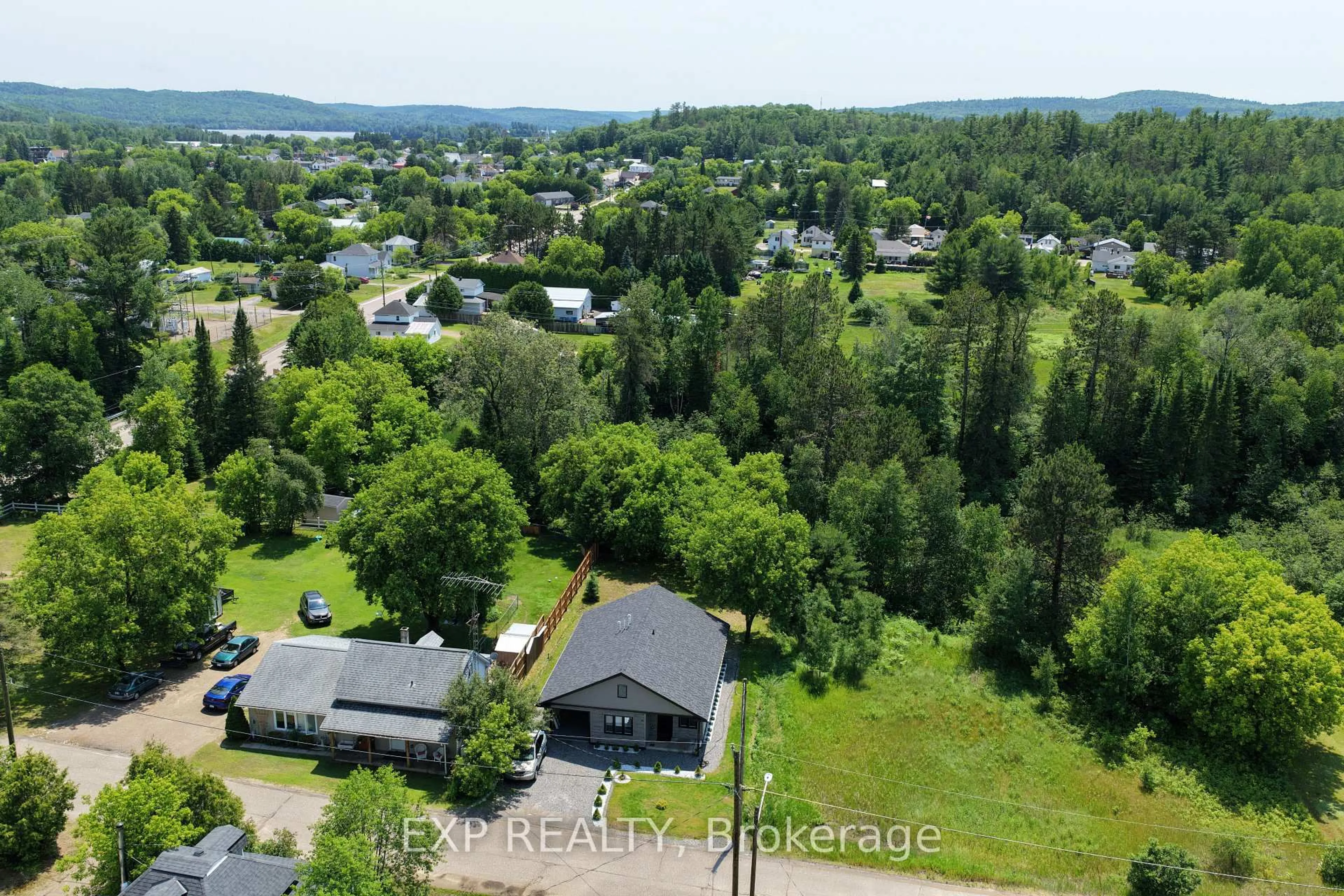 A pic from outside/outdoor area/front of a property/back of a property/a pic from drone, water/lake/river/ocean view for 15 Zilney St, Barry's Bay Ontario K0J 1B0