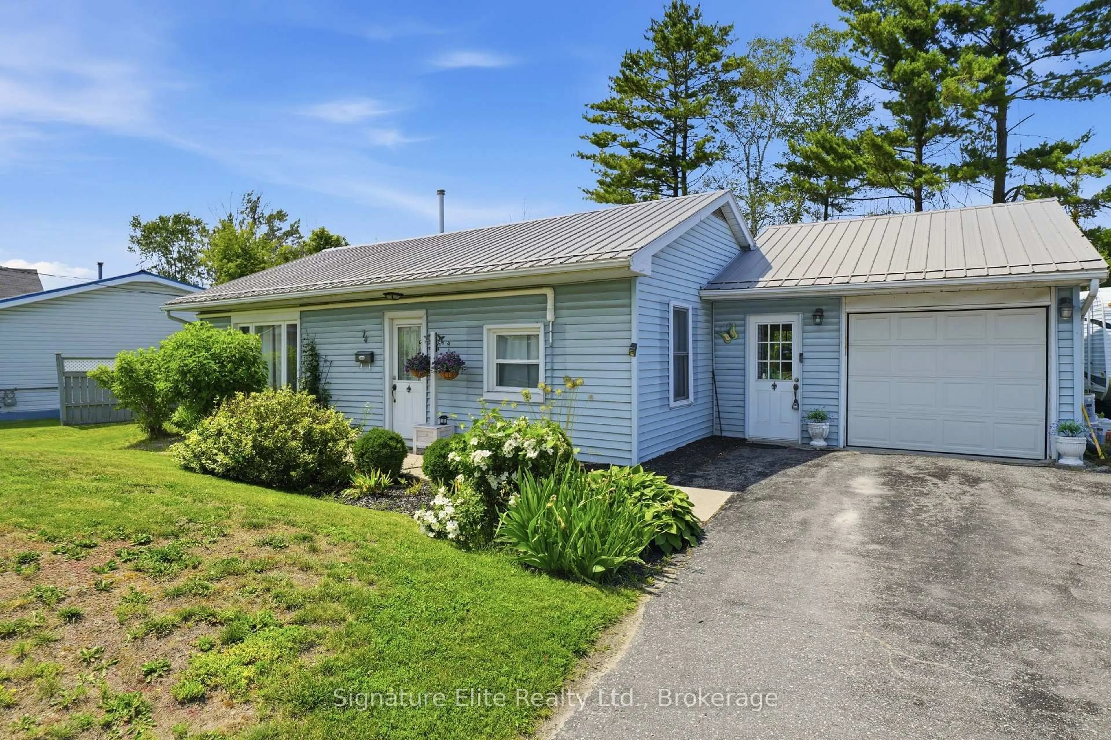 A pic from outside/outdoor area/front of a property/back of a property/a pic from drone, street for 74 Highway 33, Quinte West Ontario K8V 5P6