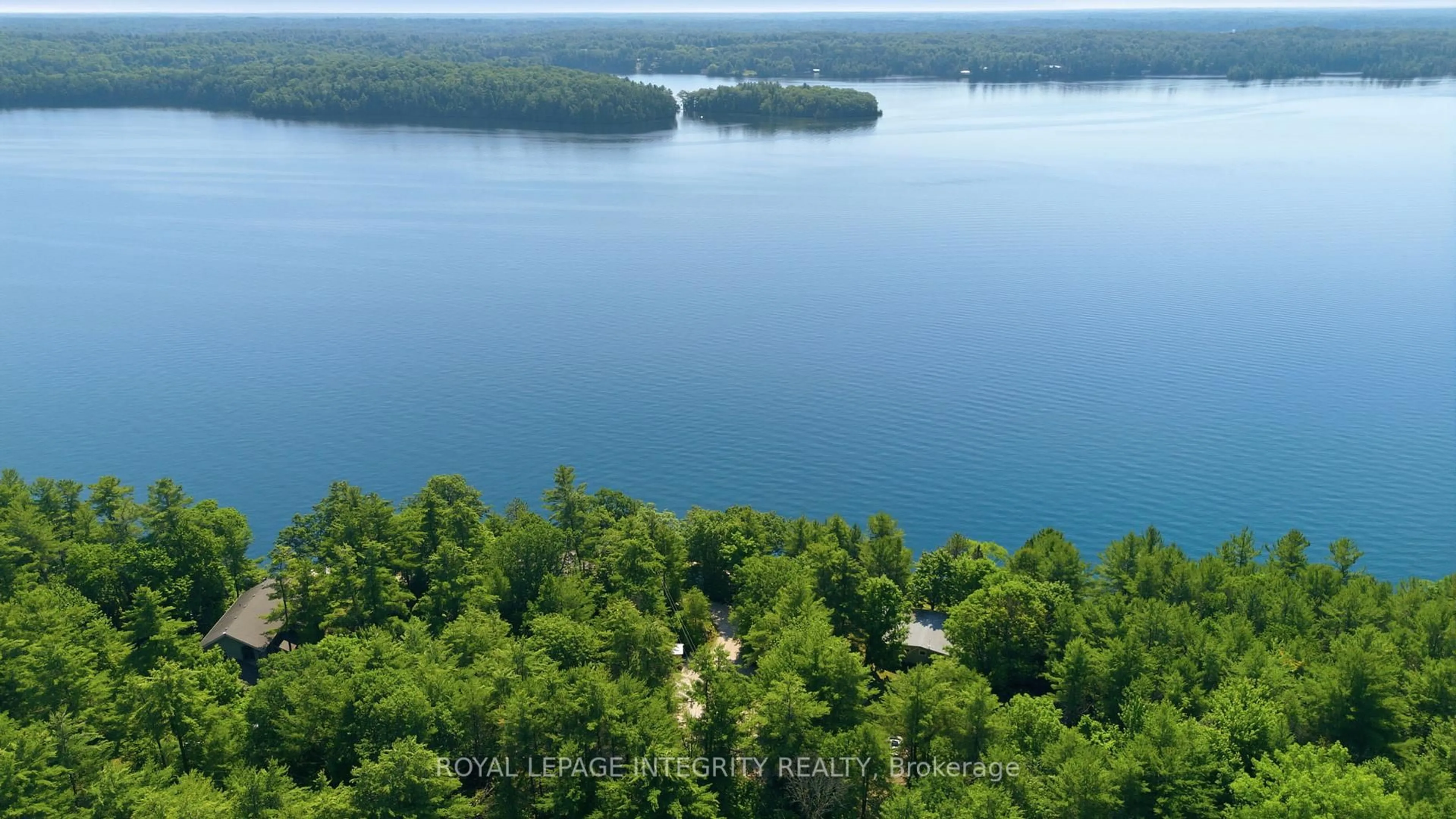 A pic from outside/outdoor area/front of a property/back of a property/a pic from drone, water/lake/river/ocean view for 905 Shady Lane, Perth Ontario K7H 3C7
