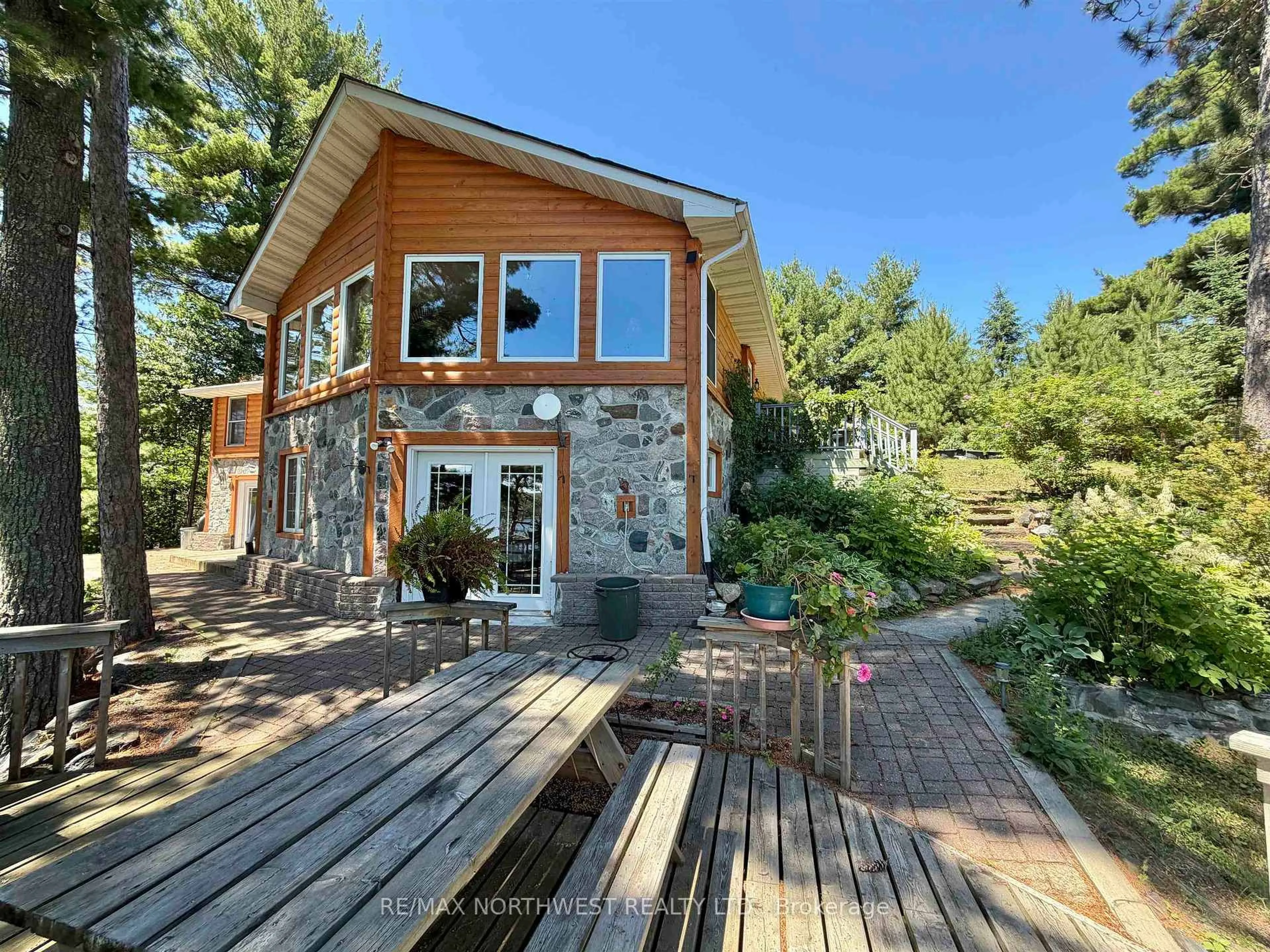 Home with brick exterior material, water/lake/river/ocean view for 543A Reef Point Rd, Rainy River Remote Area Ontario P9A 3M3