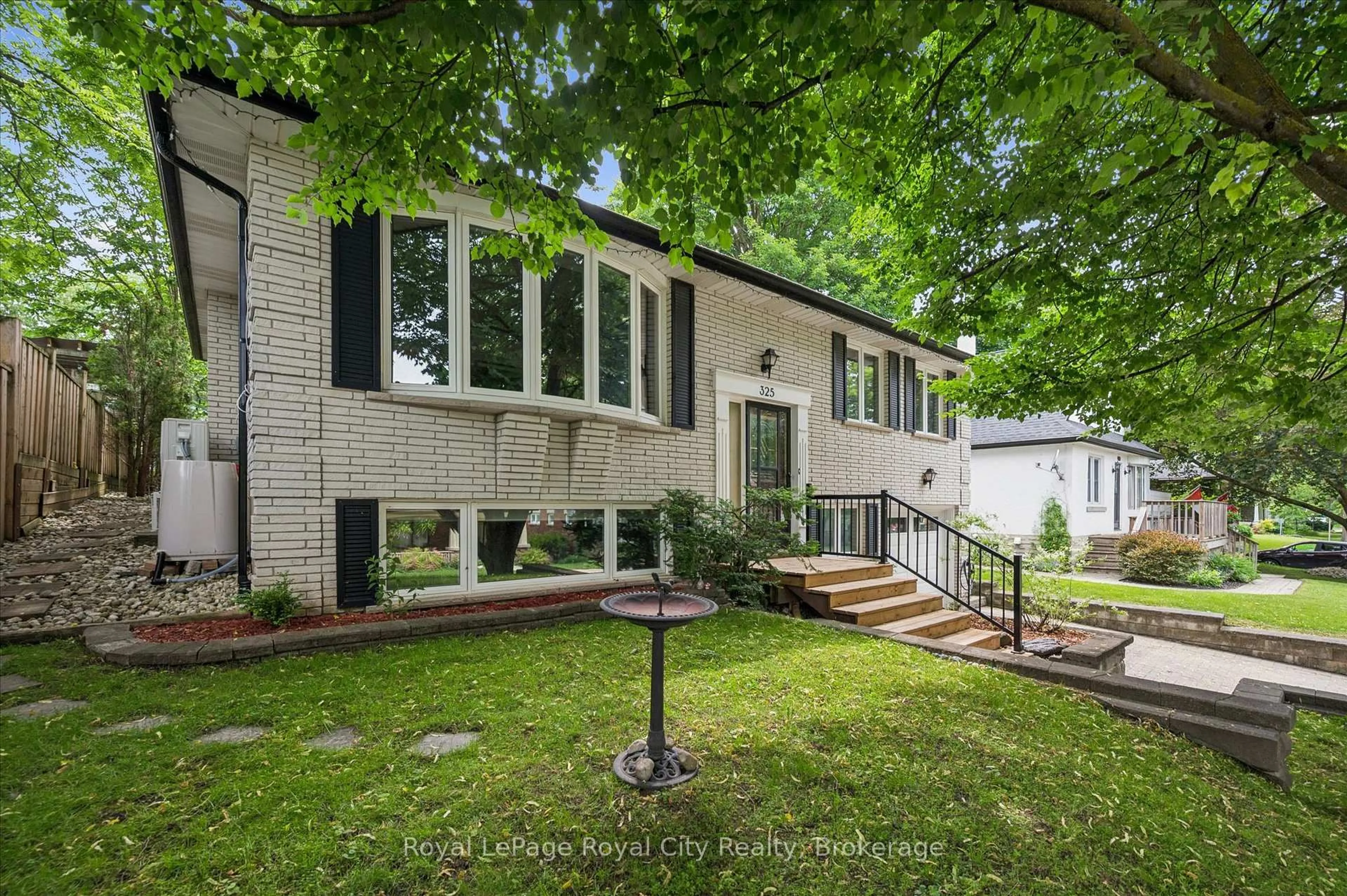 Home with brick exterior material, street for 325 Provost Lane, Centre Wellington Ontario N1M 2N2