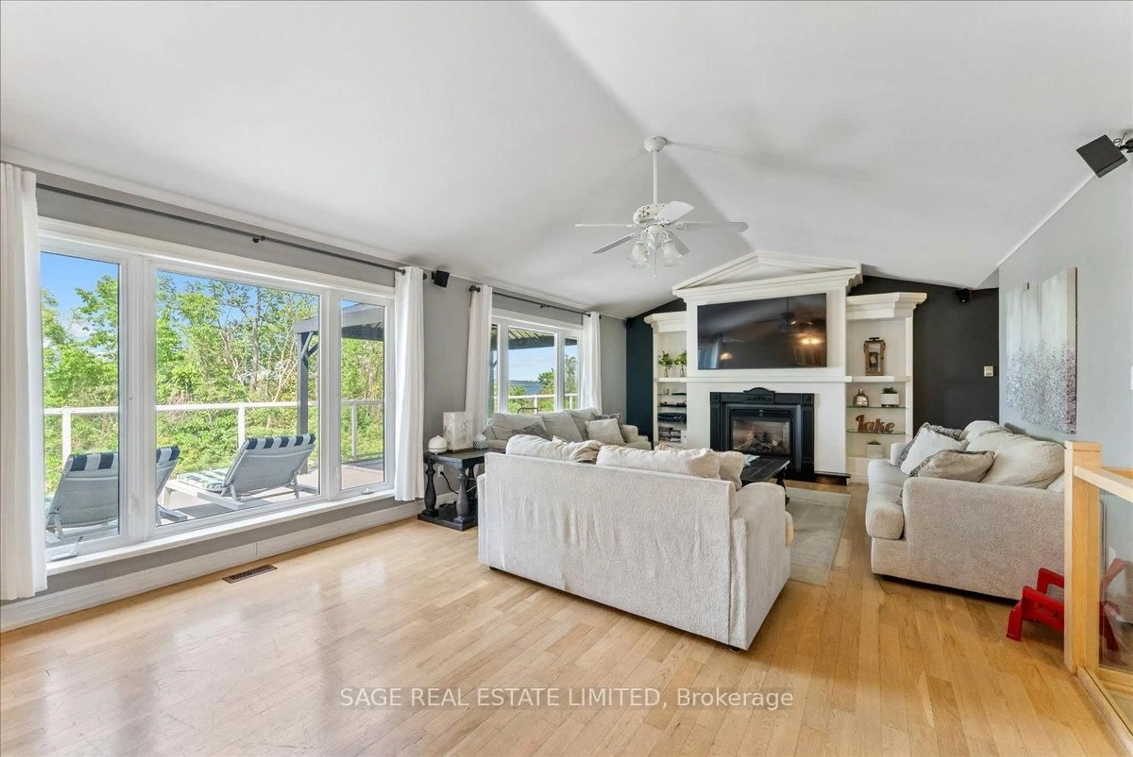 Living room with furniture, ceramic/tile floor for 1634 Morris Ave, Selwyn Ontario K0L 1T0