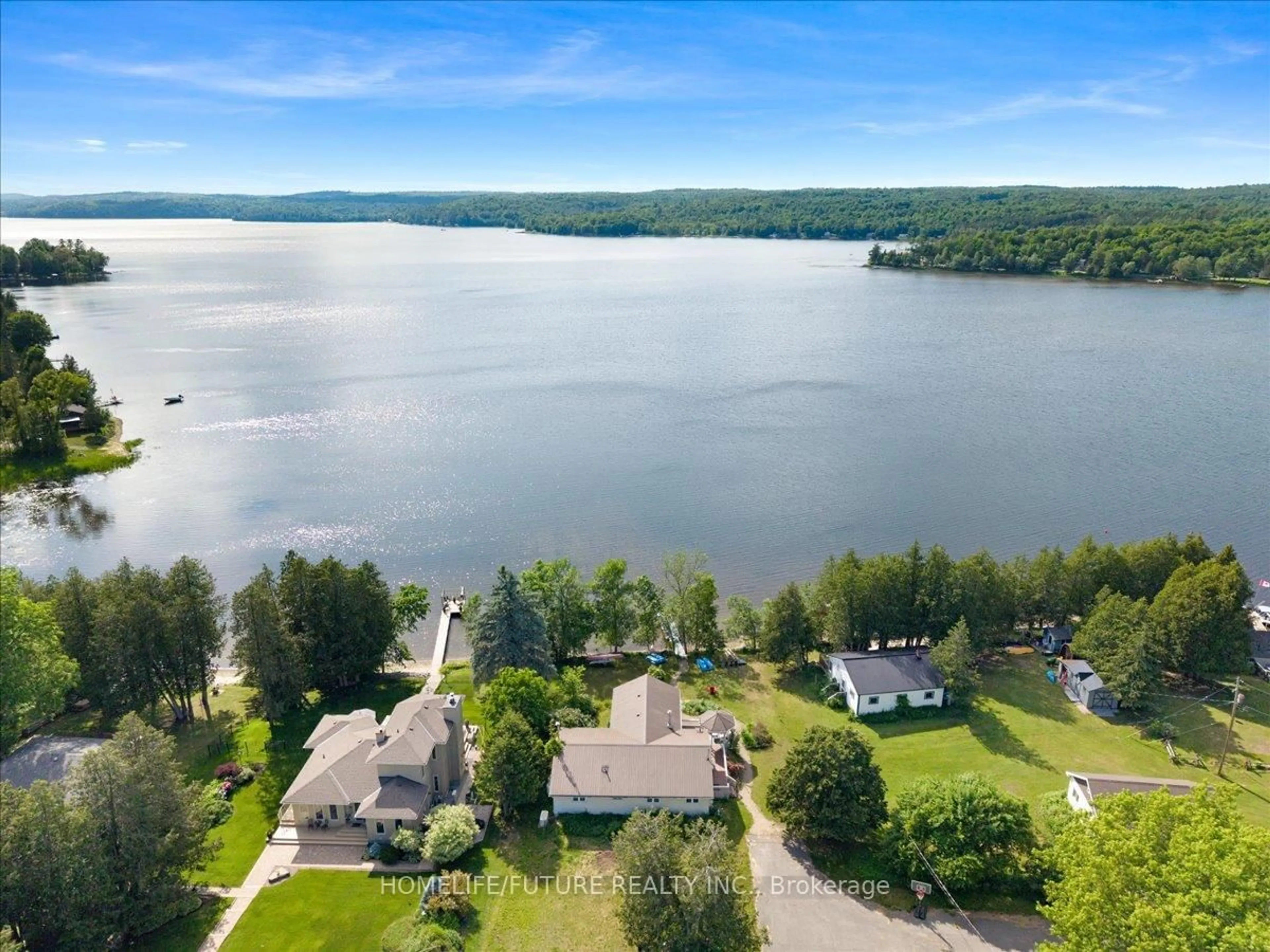 A pic from outside/outdoor area/front of a property/back of a property/a pic from drone, water/lake/river/ocean view for 442 Hall Shore Dr, Mcdonalds Corners Ontario K0G 1M0