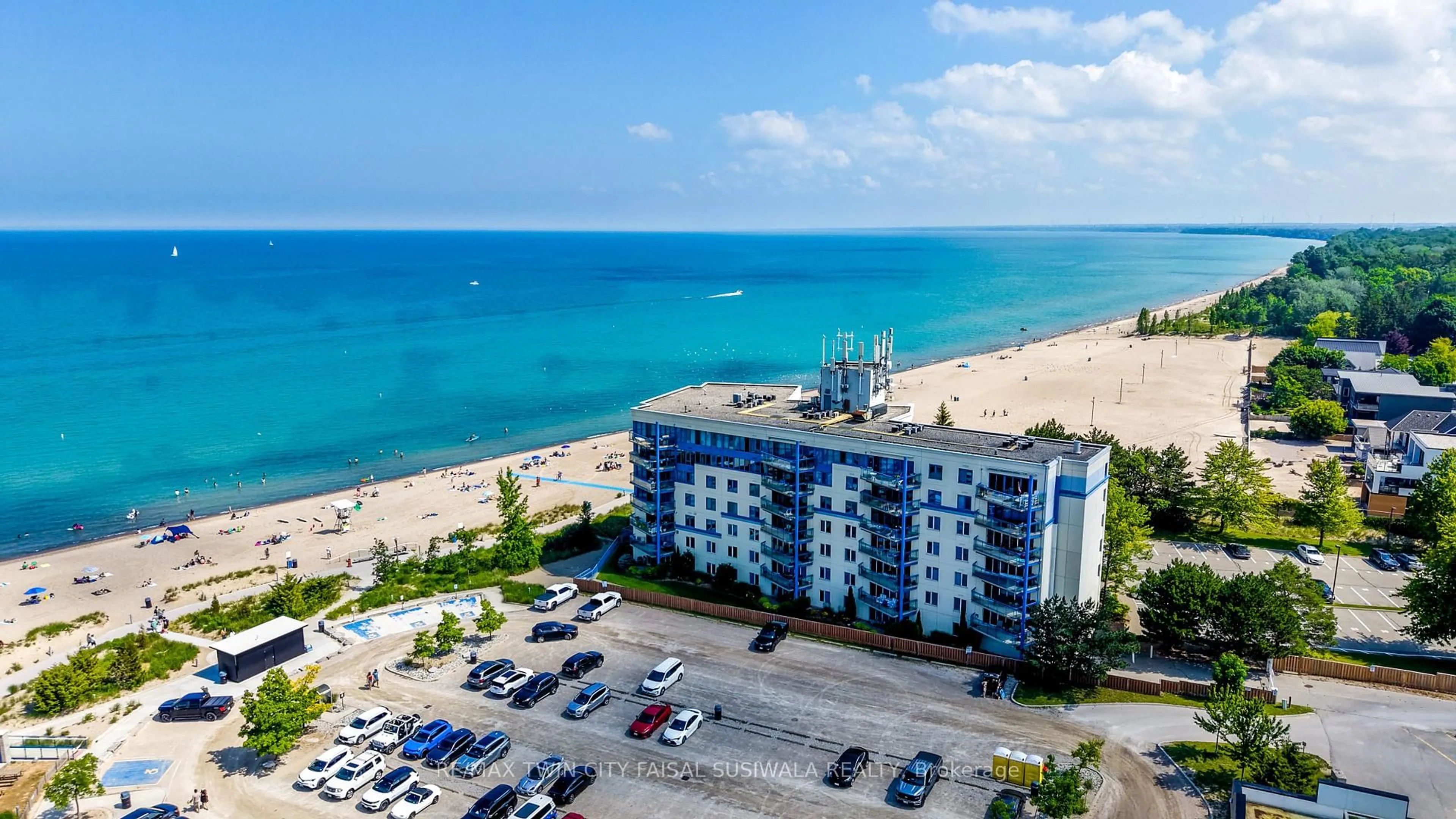 A pic from outside/outdoor area/front of a property/back of a property/a pic from drone, water/lake/river/ocean view for 9 PINE St #102, Lambton Shores Ontario N0M 1T0