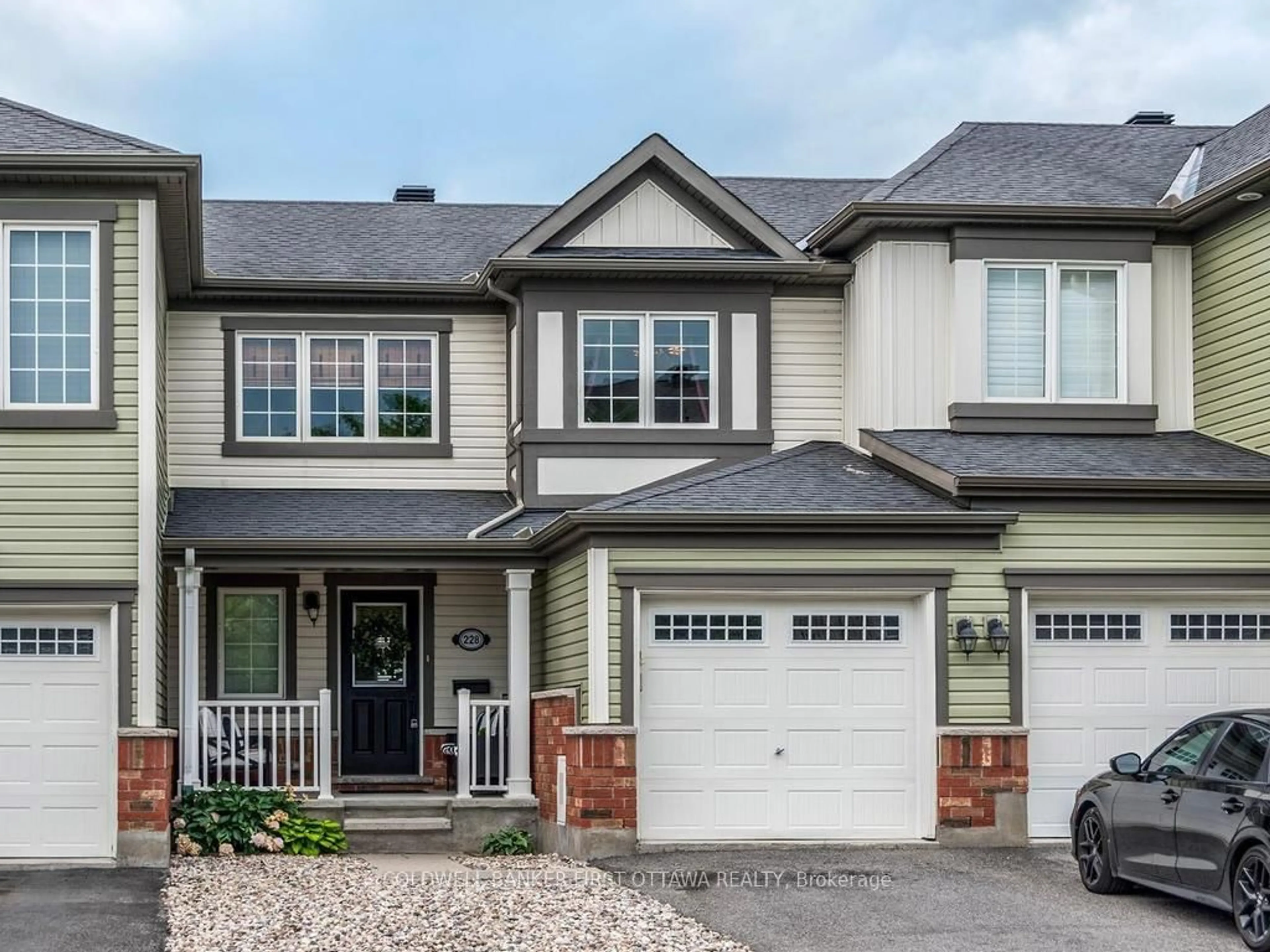 Home with vinyl exterior material, street for 228 Par-La-Ville Circ, Ottawa Ontario K2S 0T6