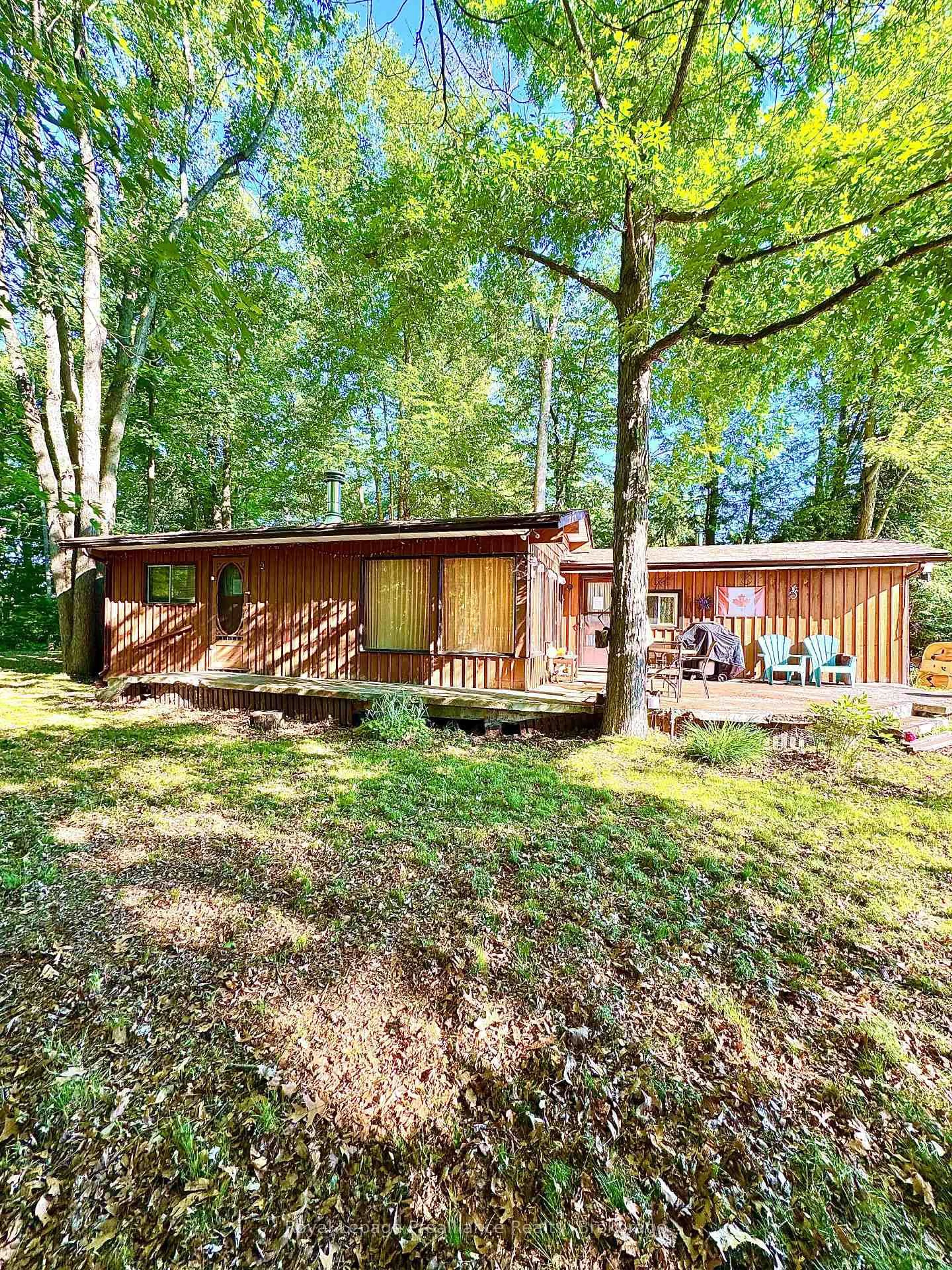 A pic from outside/outdoor area/front of a property/back of a property/a pic from drone, forest/trees view for 132 McKinnon Lane, Limoges Ontario K0K 2M0