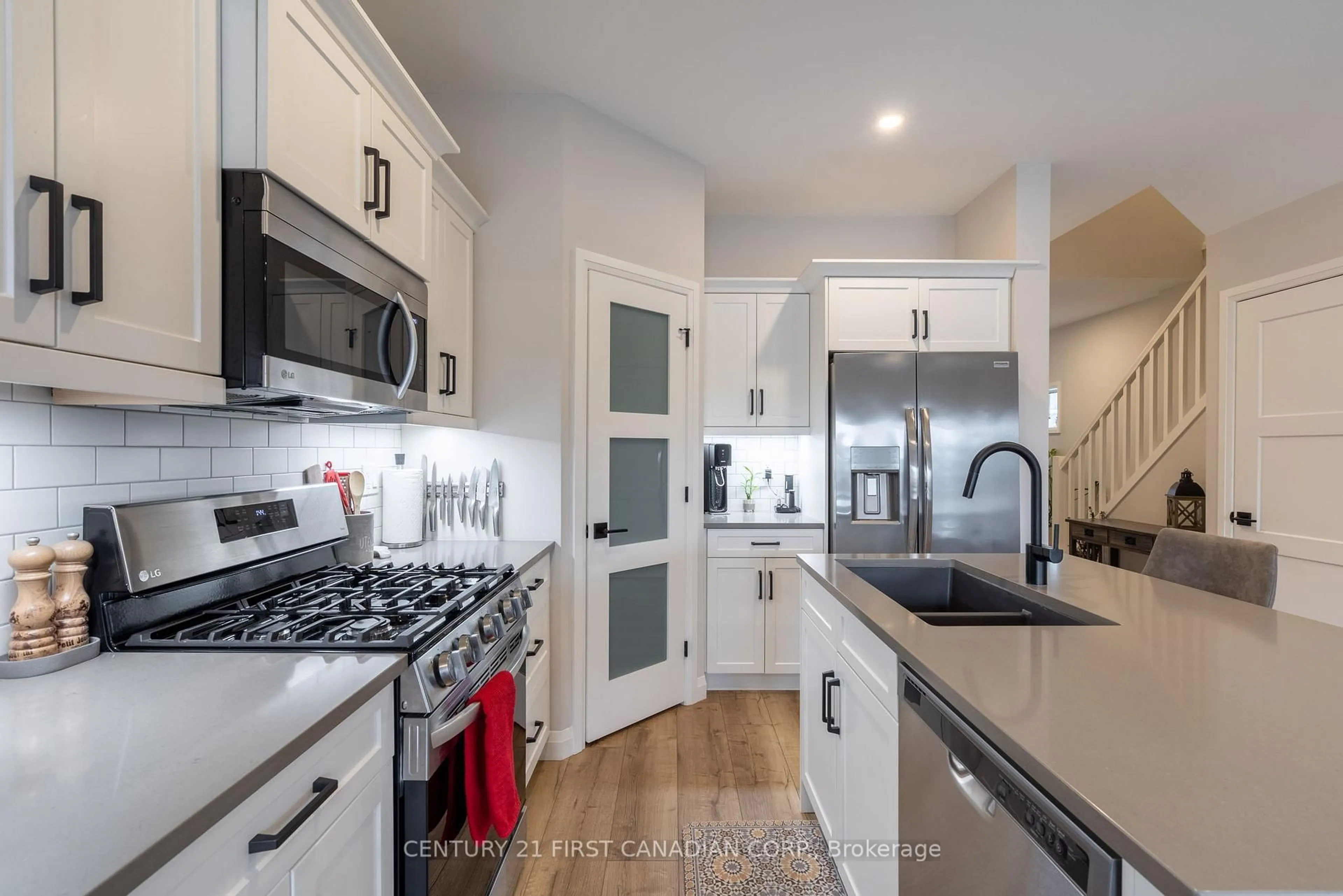Open concept kitchen, ceramic/tile floor for 17 Nicholson St #19, Lucan Biddulph Ontario N0M 2J0