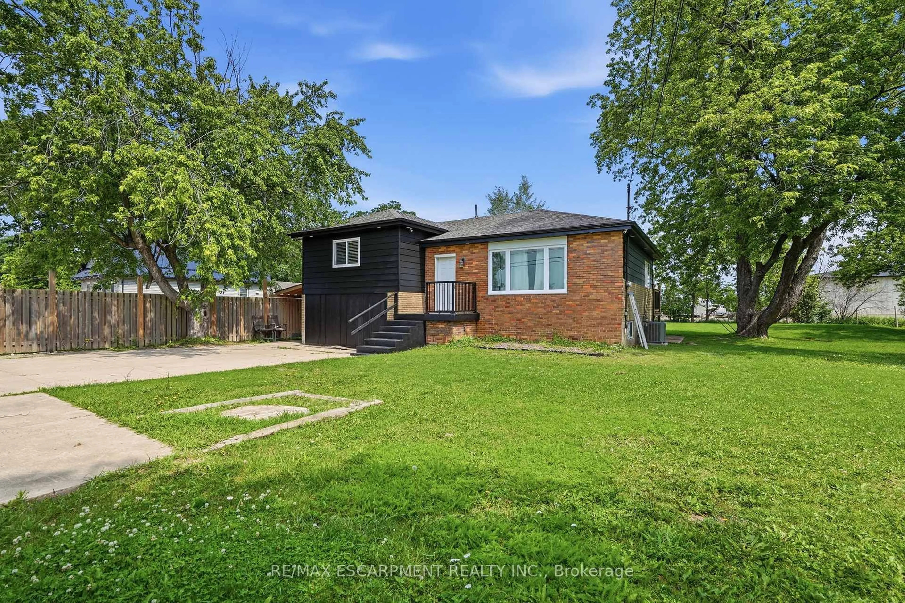 A pic from outside/outdoor area/front of a property/back of a property/a pic from drone, street for 293 #20 REGIONAL Rd, Hamilton Ontario L8J 3H4